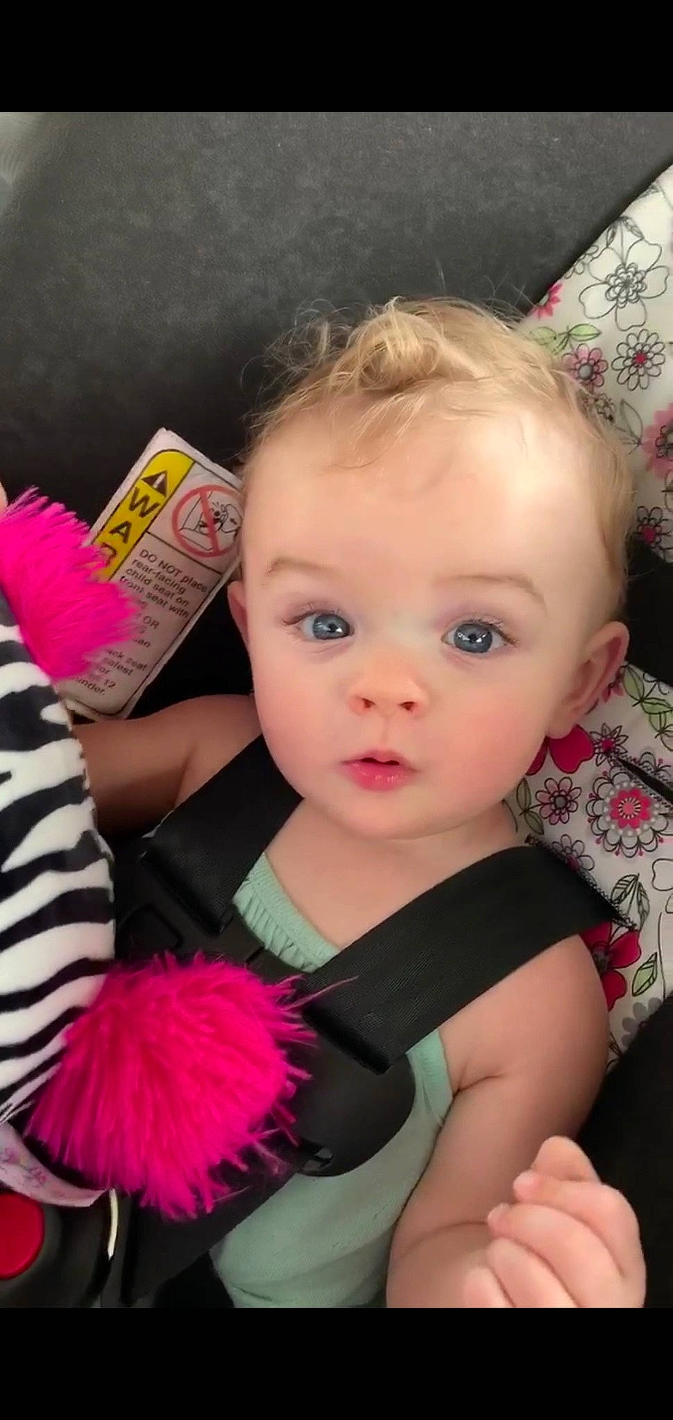 Charley is registered to the contest to win money with this photo: baby, baby_products, baby_toddler_clothing, cheek, child, eyebrow, eyelash, fashion_accessory, finger, fun, hair_accessory, happy, iris, magenta, nail, person, pink, sitting, skin, surprise