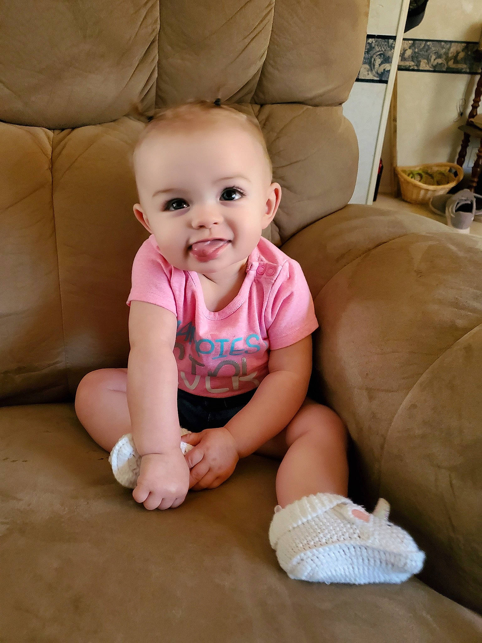 Charley Kay is registered to the contest to win money with this photo: baby, baby_toddler_clothing, cheek, child, crawling, finger, floor, flooring, head, joy, leg, person, pink, shoe, sitting, skin, toddler