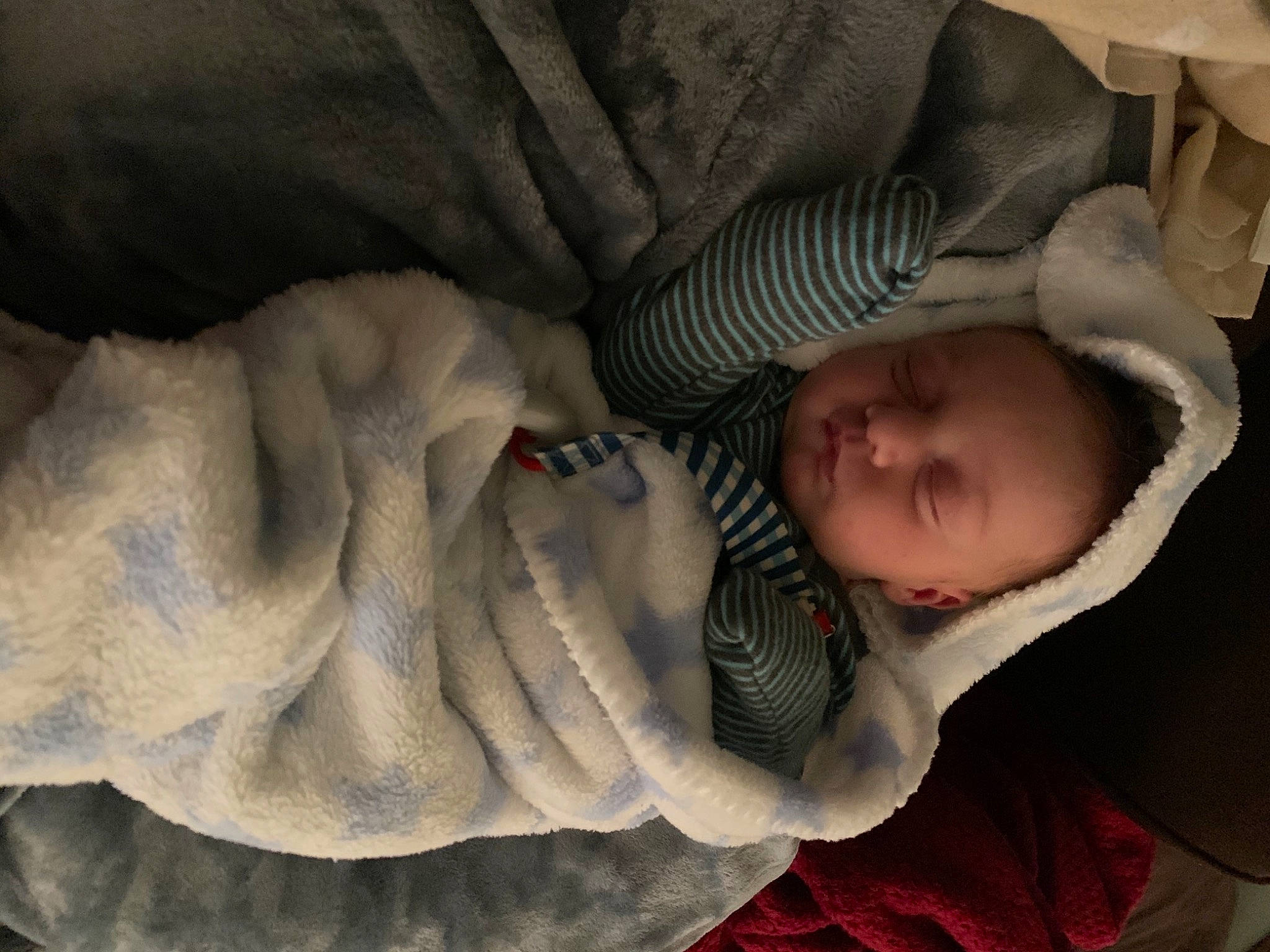 Bronson is registered to the contest to win money with this photo: arm, baby, baby_sleeping, baby_toddler_clothing, cheek, child, comfort, eye, facial_expression, finger, hand, head, linens, mammal, mouth, nose, person, skin, textile, toddler