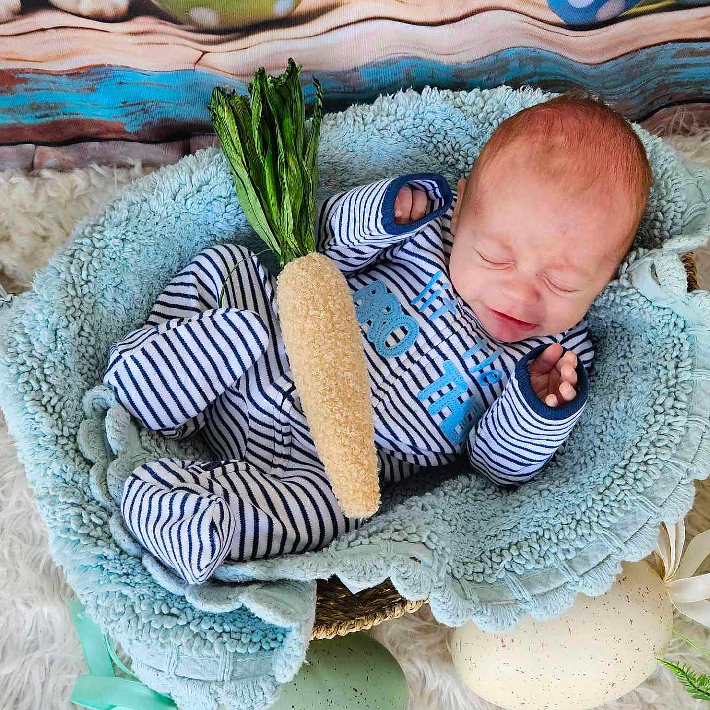 Maxton joined the competition — help win amazing prizes! baby, blanket, clothing, crib, face, food, furniture, head, infantbed, newborn, pajamas, person, plant, produce, springonion, vegetable, yawning