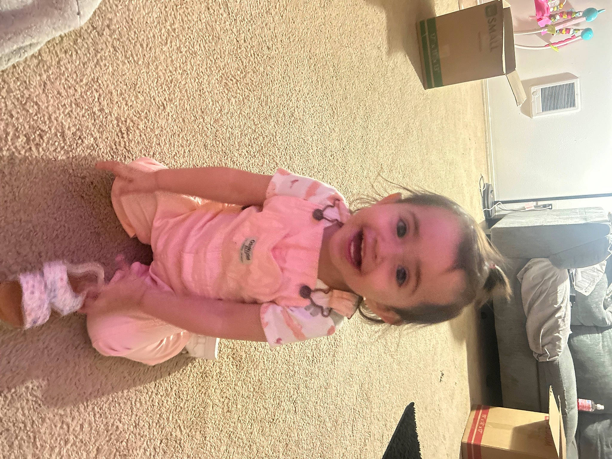 Evelia is registered to the contest to win money with this photo: baby, baby_products, baby_toddler_clothing, cheek, child, comfort, floor, flooring, fun, happy, hardwood, joy, person, room, skin, smile, toddler, vacation, wood