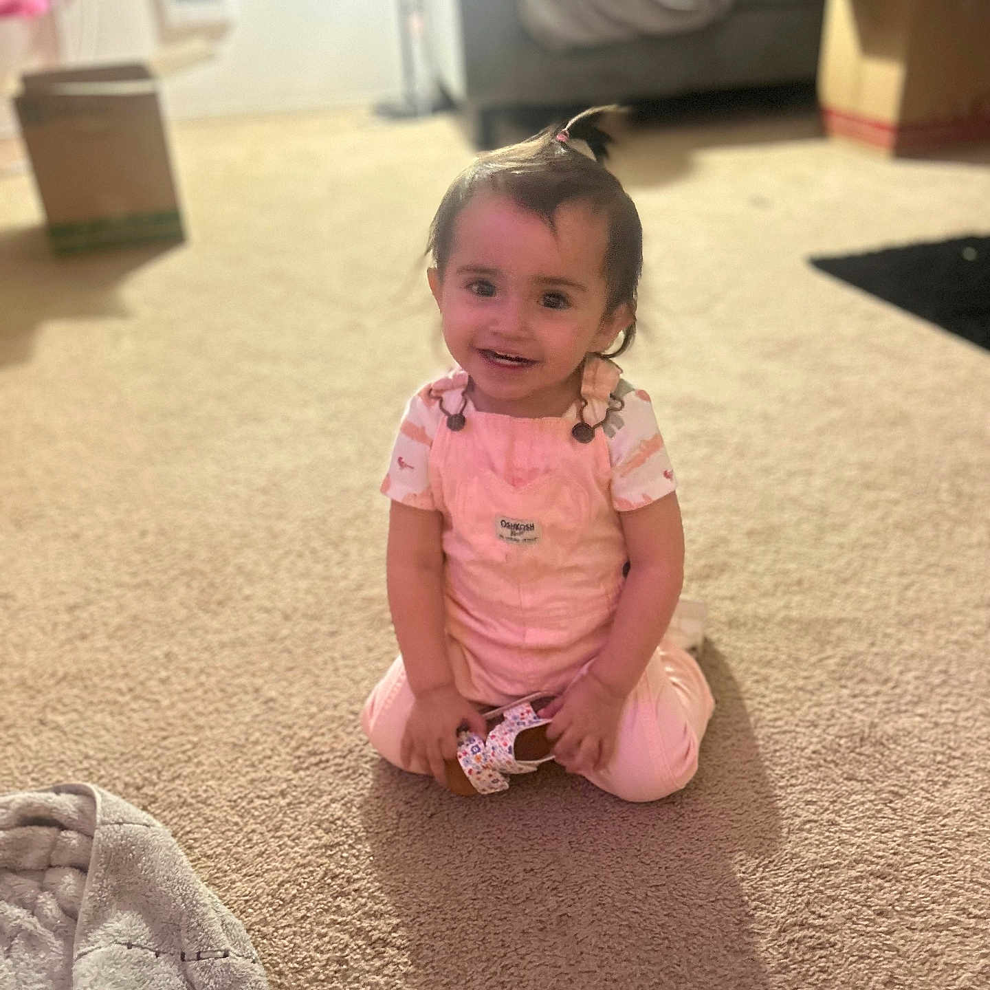 Alessandra is registered to the contest to win money with this photo: architecture, ball, child, clothing, couch, face, female, football, furniture, girl, head, homedecor, pants, person, photography, portrait, sitting, soccer, soccerball, sport