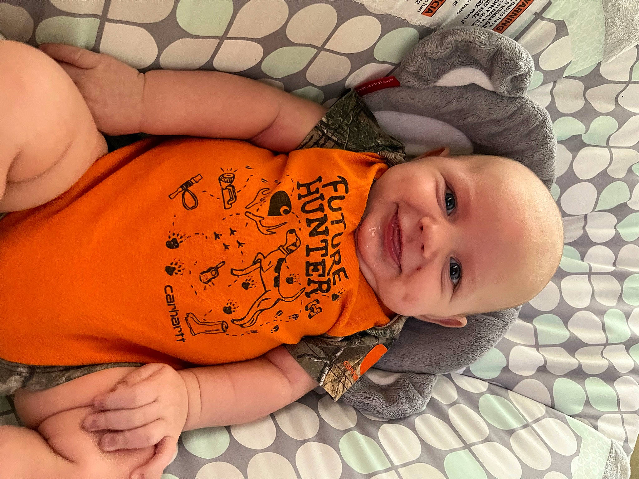 Kyler Lewis is registered to the contest to win money with this photo: baby, baby_toddler_clothing, cheek, child, comfort, face, finger, flooring, hand, happy, head, human_body, joy, mouth, nail, nose, person, skin, smile, thigh