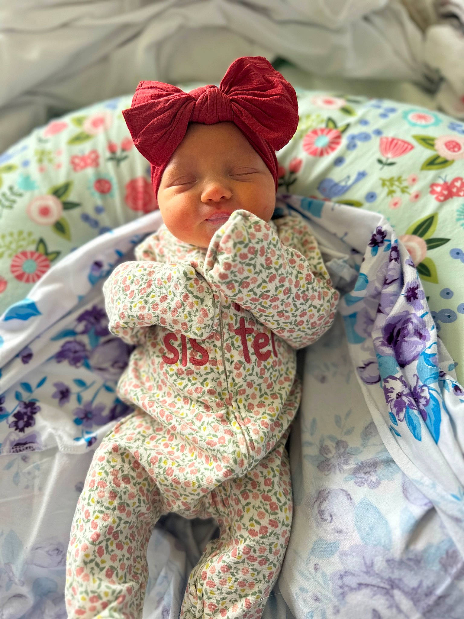 Oaklynn joined the competition — help win amazing prizes! baby, baby_products, baby_sleeping, baby_toddler_clothing, bed_sheet, bedding, cap, child, comfort, hat, headwear, linens, pattern, person, product, room, sitting, skin, sleeve, textile