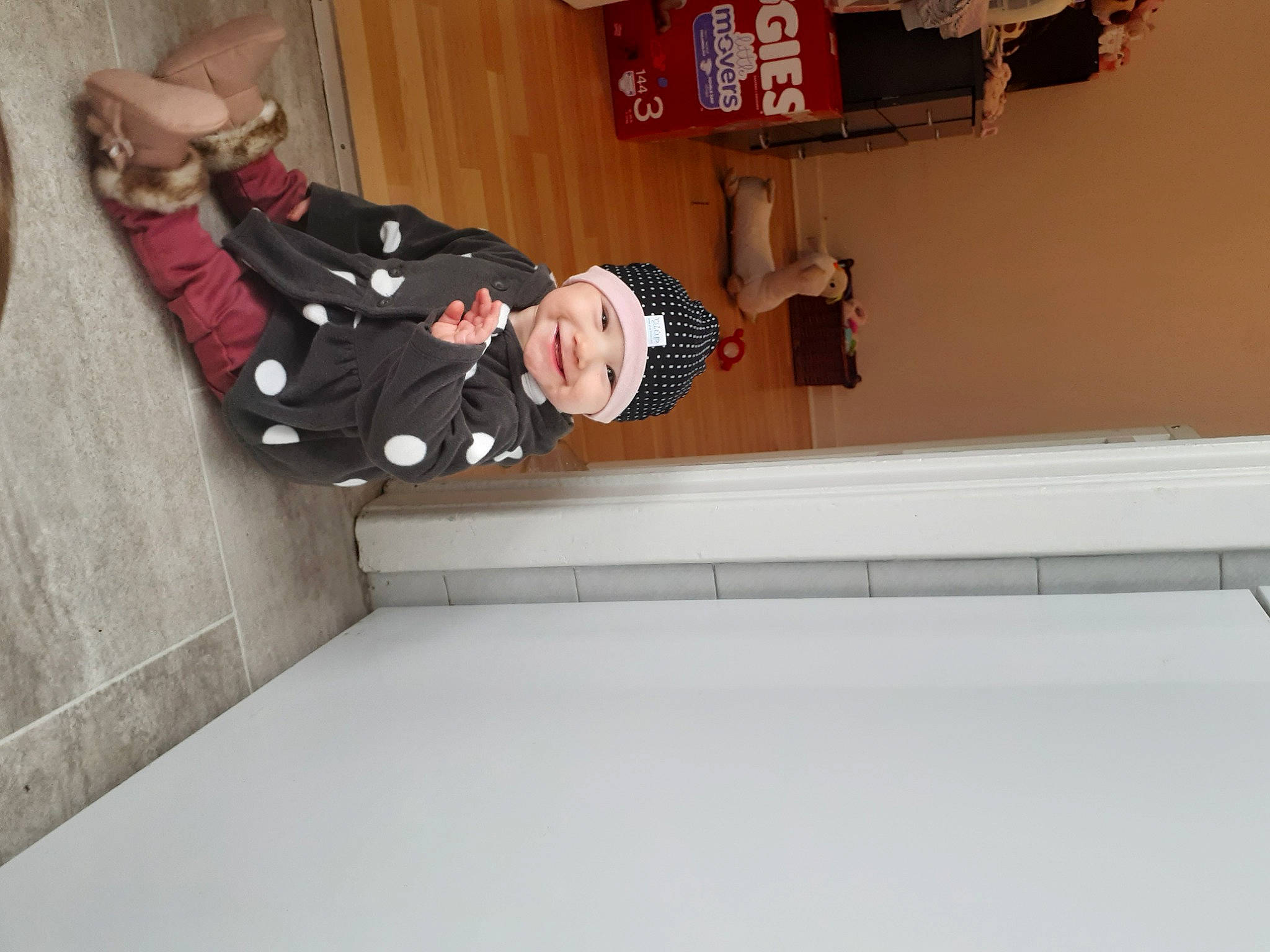 Alyssa Lambert participe au concours pour gagner de l'argent avec cette photo : building, comfort, door, dress, flooring, formal_wear, fun, hardwood, headwear, joy, person, room, sitting, stairs, suit, toddler, window, wood, wrist