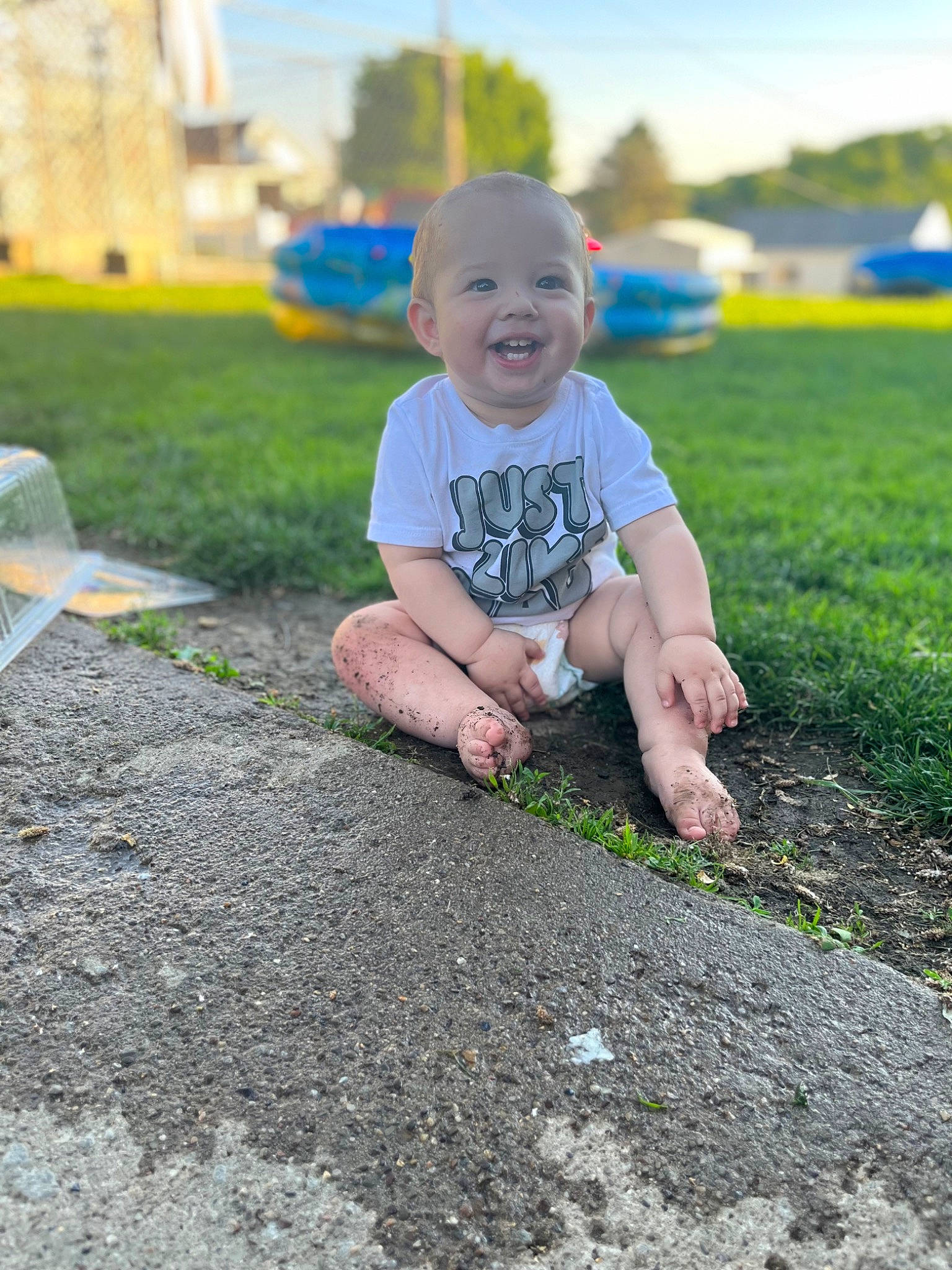Ty is registered to the contest to win money with this photo: asphalt, baby, child, fun, grass, grass_family, happy, joy, landscape, lawn, leaf, leisure, people_in_nature, person, plant, public_space, recreation, road_surface, sky, smile