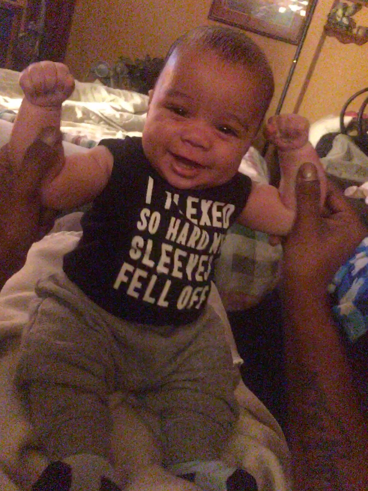 Kael is registered to the contest to win money with this photo: arm, baby, child, muscle, person, toddler