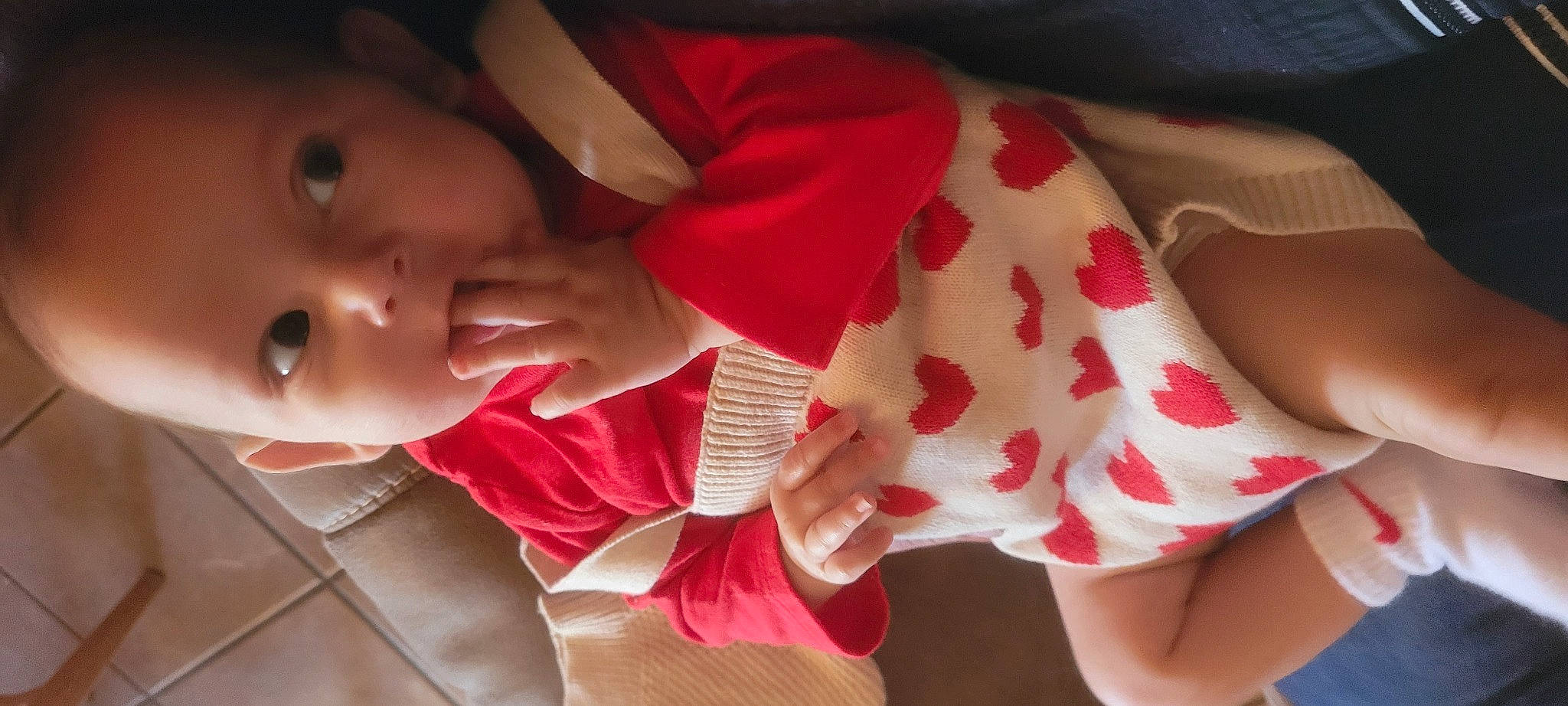 Nevaeh is registered to the contest to win money with this photo: baby, baby_toddler_clothing, carmine, comfort, dress, event, foot, happy, human_body, human_leg, knee, linens, lip, nail, nose, person, skin, sleeve, sock, thigh