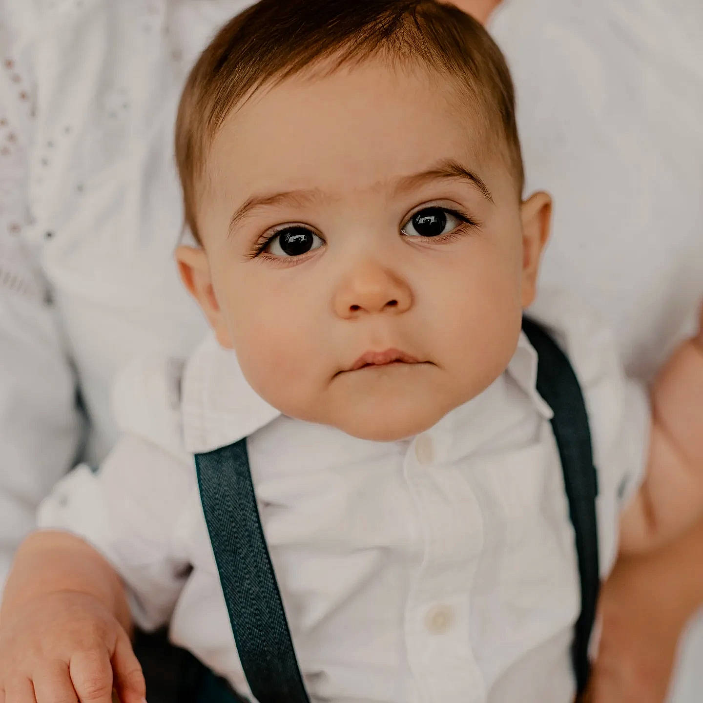 Wesley is registered to the contest to win money with this photo: baby, baby_toddler_clothing, cheek, child, close_up, collar, comfort, eyelash, finger, flash_photography, gesture, hand, happy, iris, lip, no_expression, nose, person, skin, sleeve