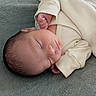 baby, newborn, sleeping, infant, blanket, onesie, soft_texture, peaceful, cute, child, face, skin, hand, fingers, cozy, rest, indoors, portrait, closeup, sleep