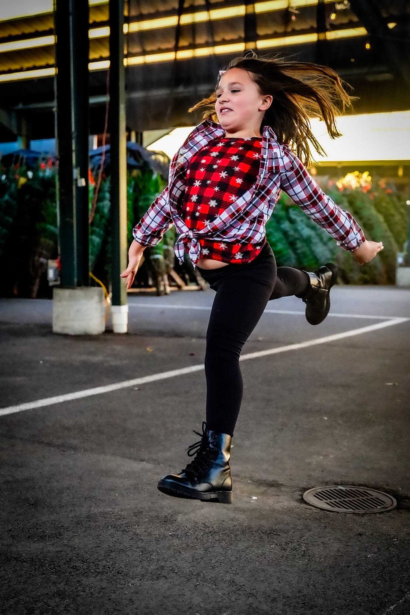 Amya is registered to the contest to win money with this photo: asphalt, city, electric_blue, entertainment, event, eyewear, fashion_design, flash_photography, flowerpot, human_leg, knee, pattern, performing_arts, person, plaid, plant, road, sportswear, tartan, thigh
