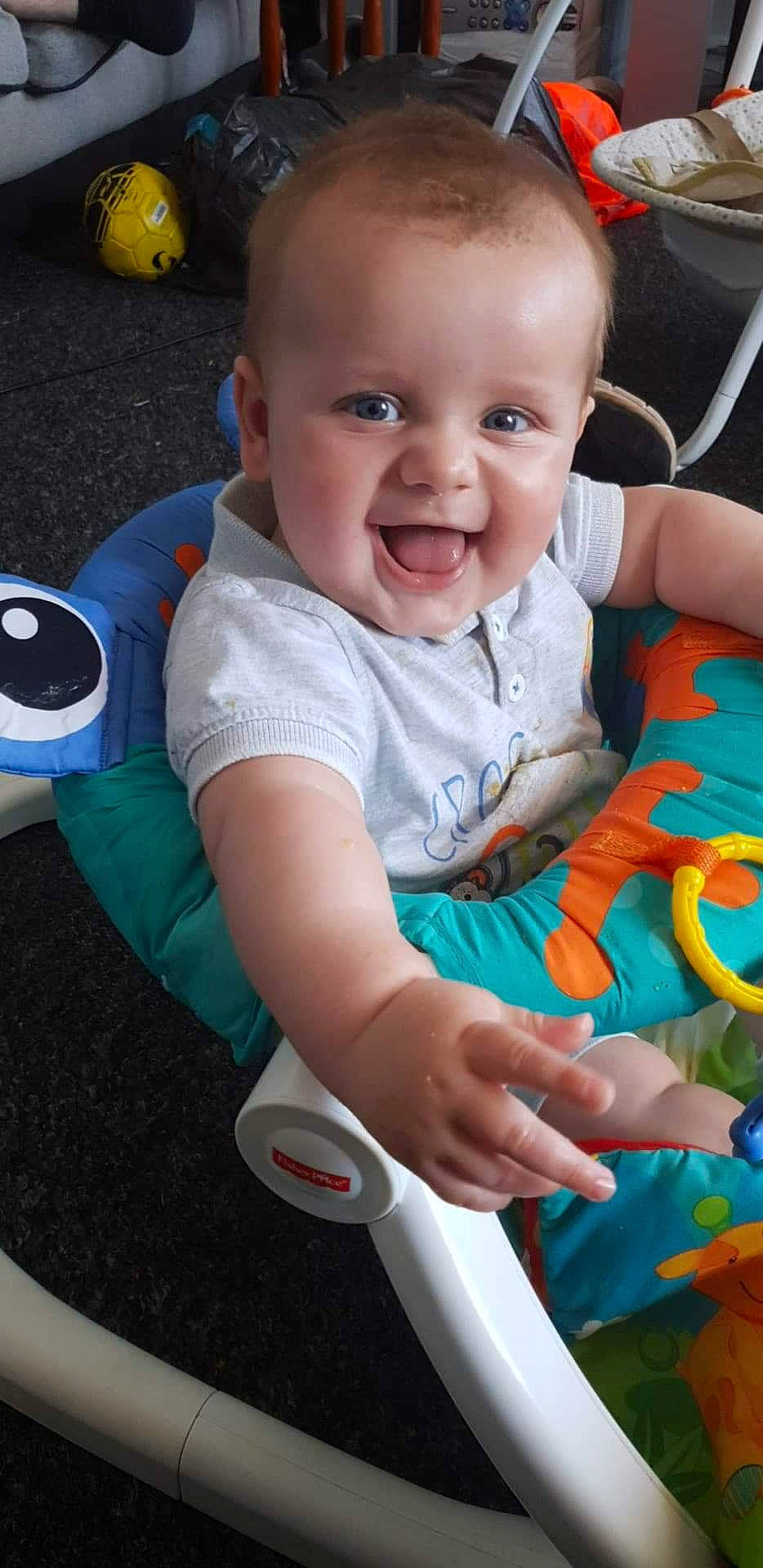 Aaron joined the competition — help win amazing prizes! baby, baby_products, baby_toys, child, joy, person, play, product, sitting, smile, toddler, tummy_time