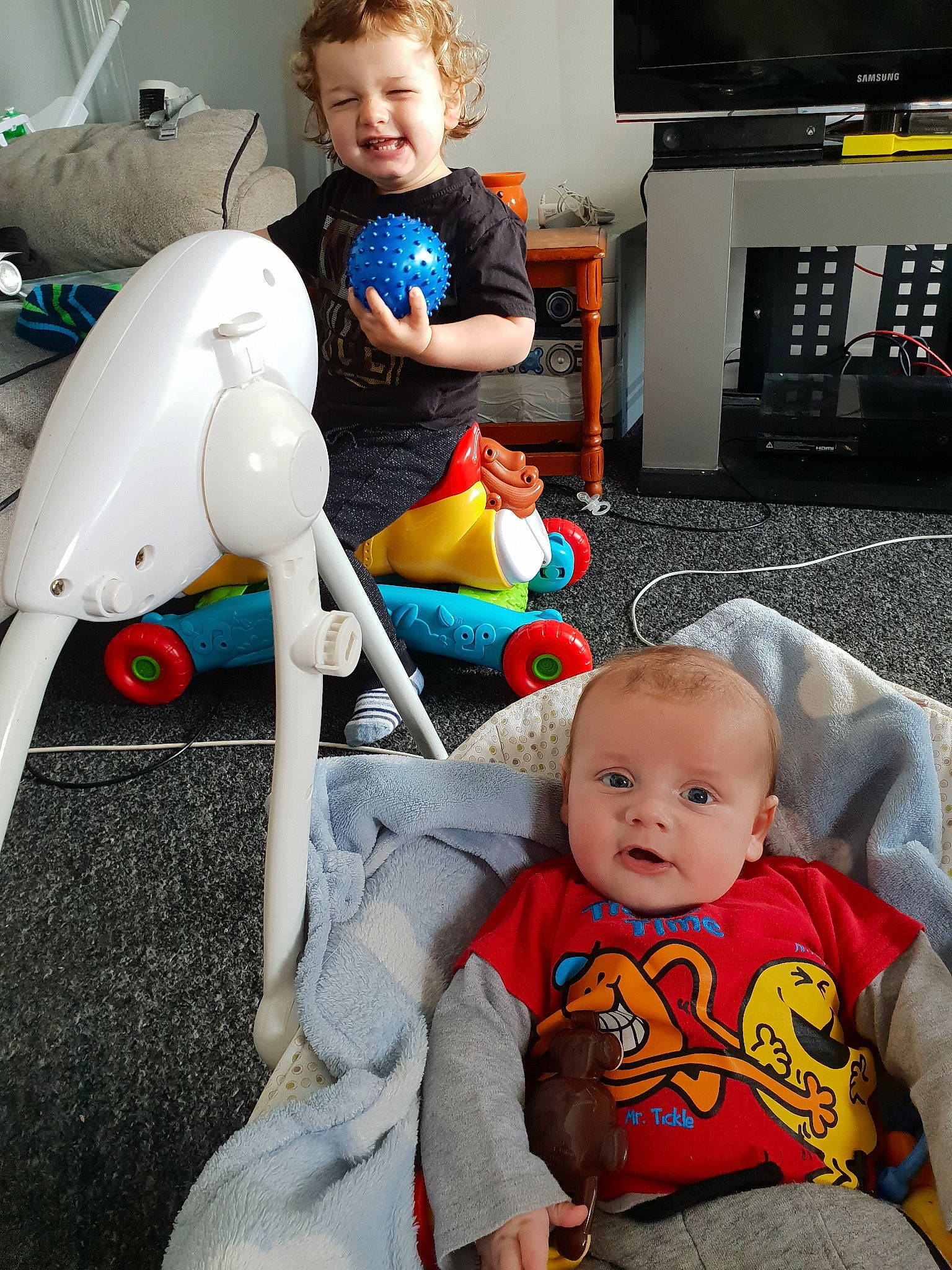 Logan joined the competition — help win amazing prizes! baby, child, joy, leg, person, play, product, room, sitting, toddler, toy