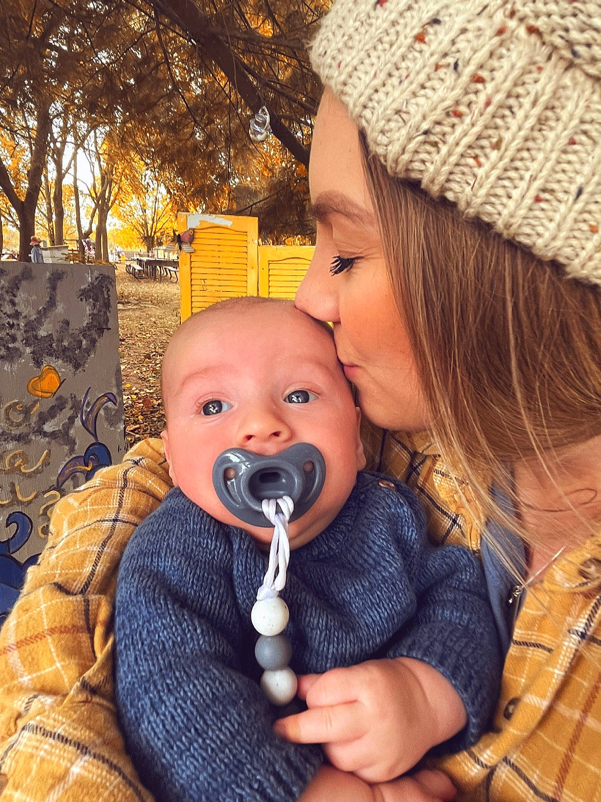 Elijah is registered to the contest to win money with this photo: baby, baby_toddler_clothing, cap, cheek, eye, fun, gesture, happy, lip, microphone, mouth, nose, organ, outerwear, people, people_in_nature, person, photograph, skin, toddler