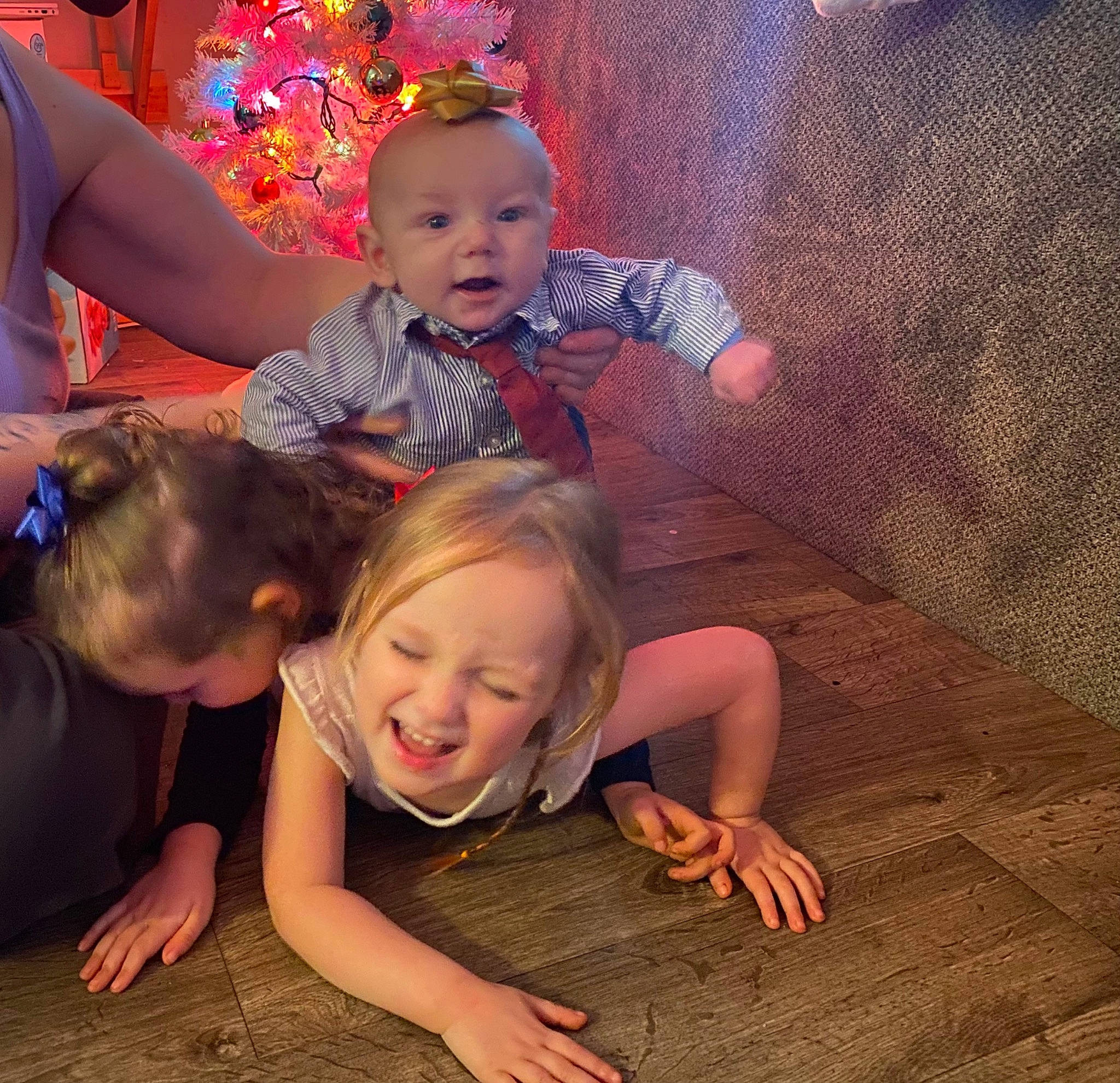 Nathaniel is registered to the contest to win money with this photo: baby_toddler_clothing, child, event, eye, finger, flash_photography, flooring, foot, fun, happy, human_body, iris, leg, mouth, organ, person, photograph, smile, t_shirt, toddler