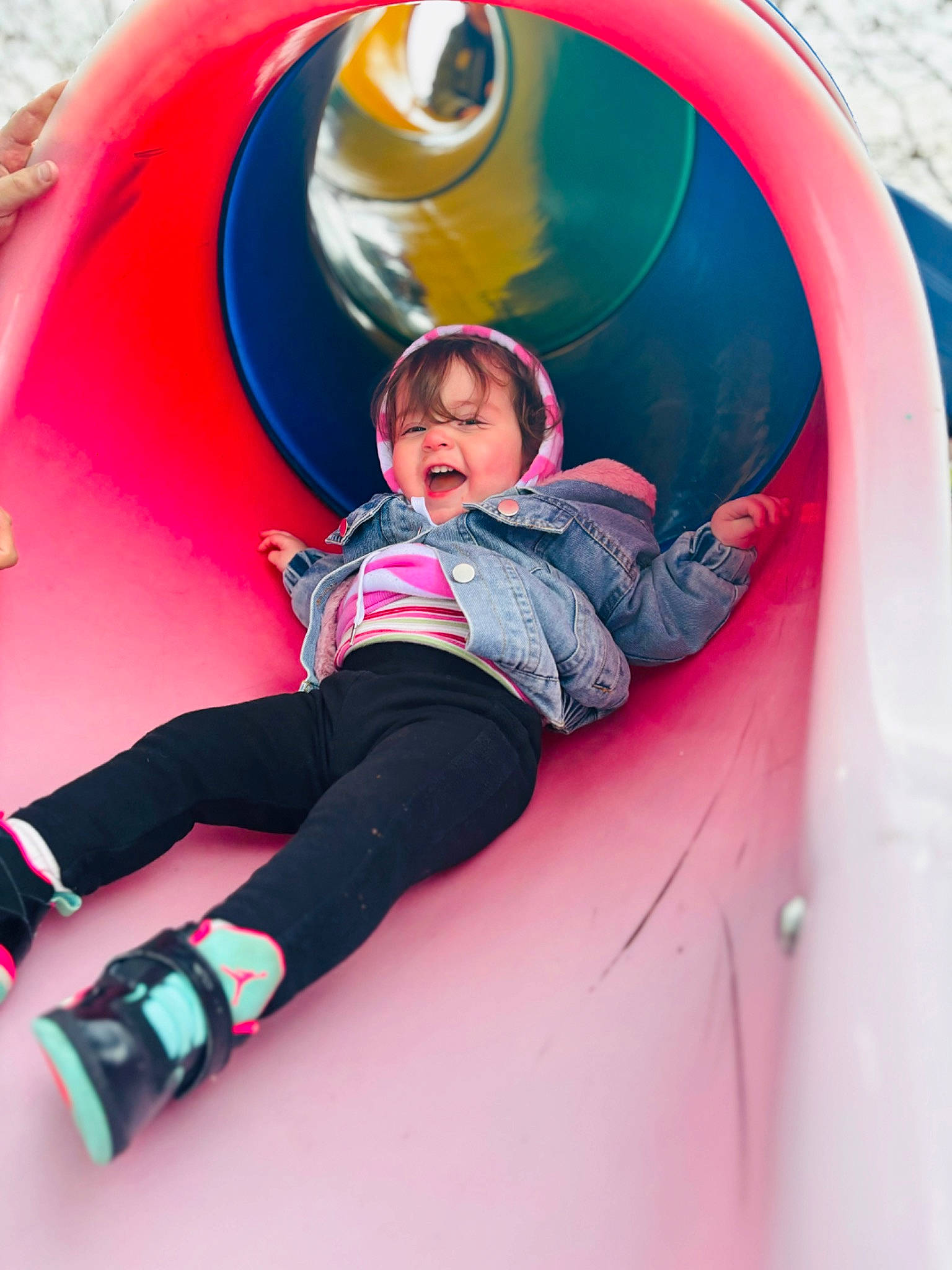 Oakley joined the competition — help win amazing prizes! automotive_exterior, automotive_tire, automotive_wheel_system, bumper, child, chute, electric_blue, fun, helmet, inflatable, leisure, magenta, motor_vehicle, outdoor_play_equipment, person, personal_protective_equipment, pink, plant, playground, recreation