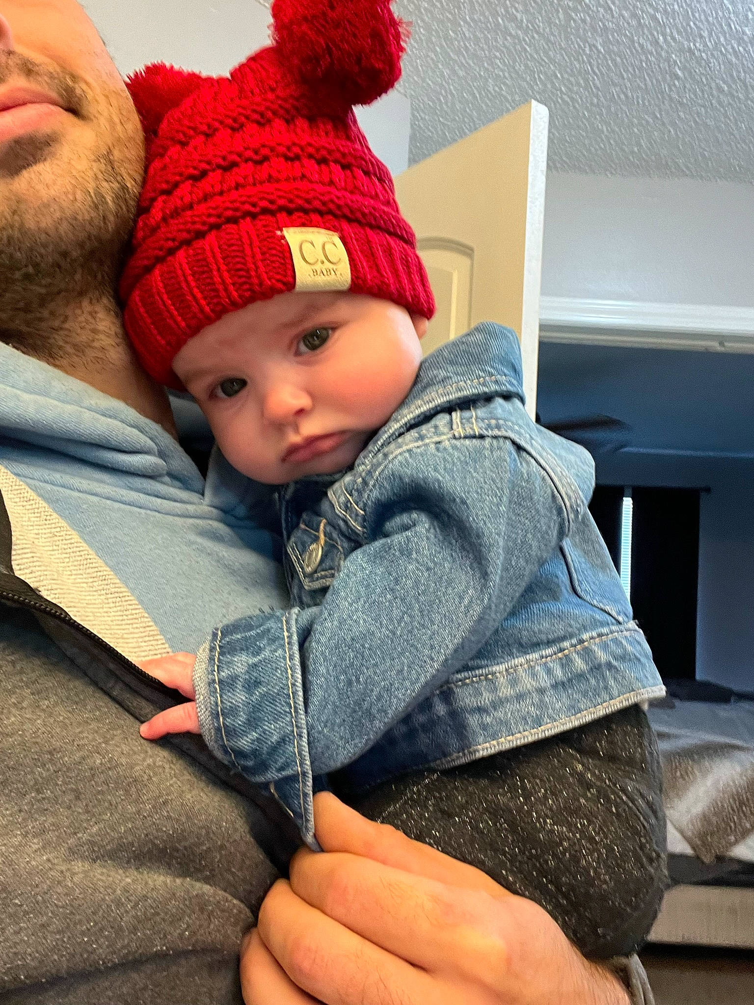 Bryce is registered to the contest to win money with this photo: baby, cap, child, comfort, cool, electric_blue, gesture, hand, happy, headgear, headwear, human_body, knit_cap, lip, outerwear, person, plaid, sleeve, textile, toddler