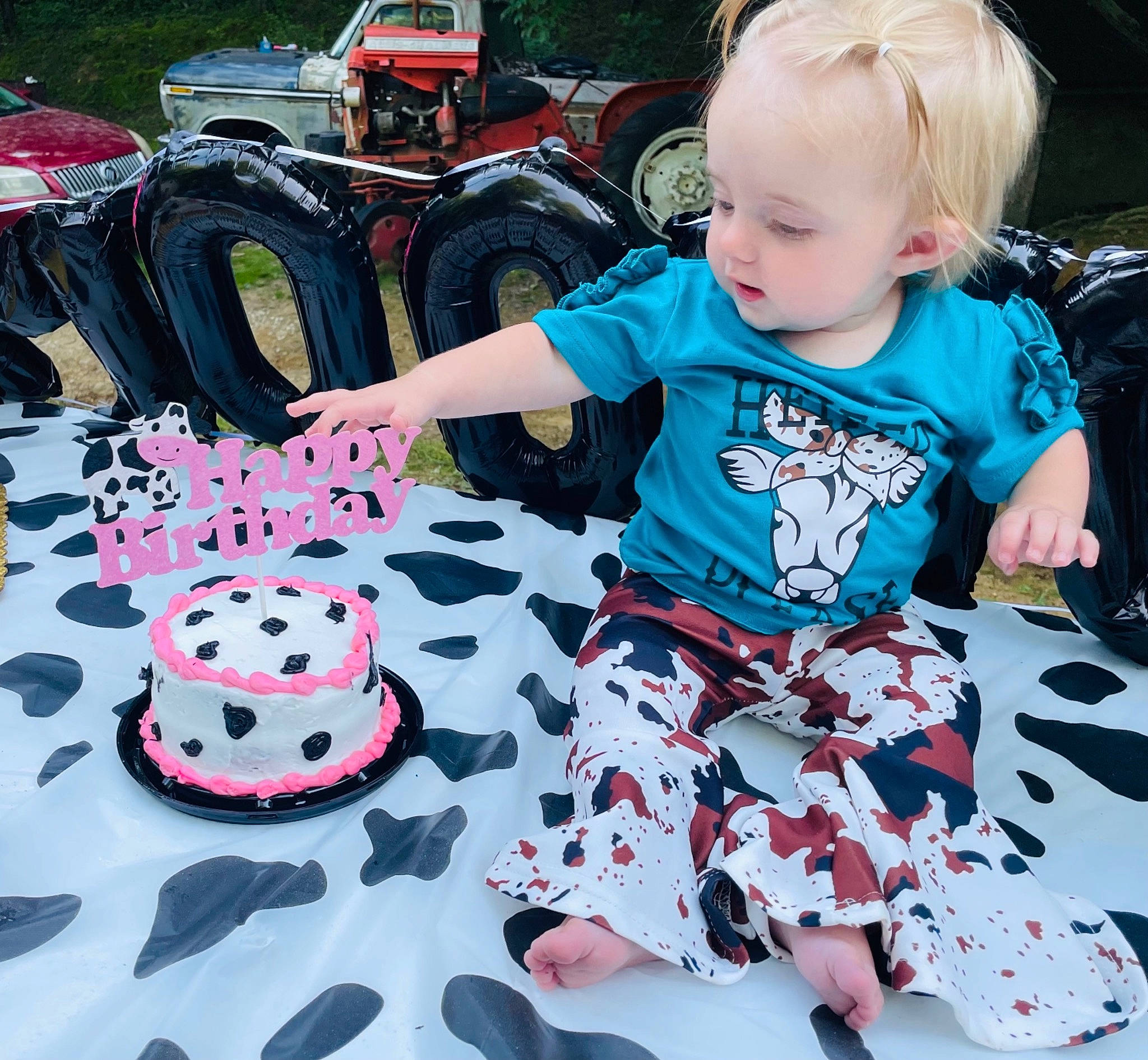 Emma Grace is registered to the contest to win money with this photo: automotive_tire, baby, baby_toddler_clothing, carmine, chair, event, fun, grass, happy, mammal, pattern, person, pink, recreation, red, sleeve, textile, tire, toddler, vertebrate