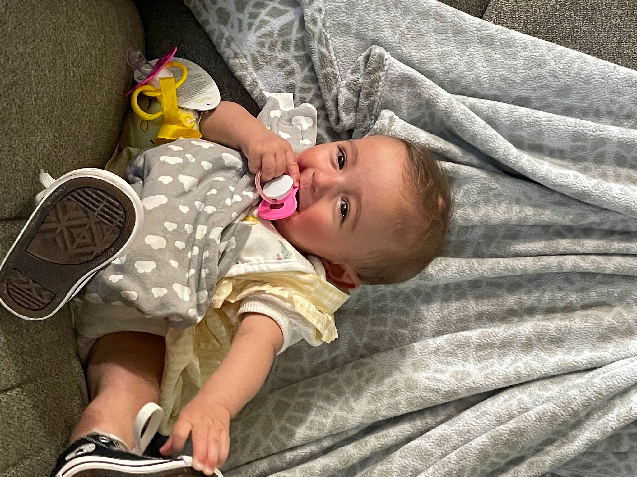 Addilynn joined the competition — help win amazing prizes! baby, baby_products, baby_toddler_clothing, child, comfort, eyewear, foot, fun, grass, happy, human_leg, knee, leisure, linens, pattern, person, play, sitting, textile, toddler