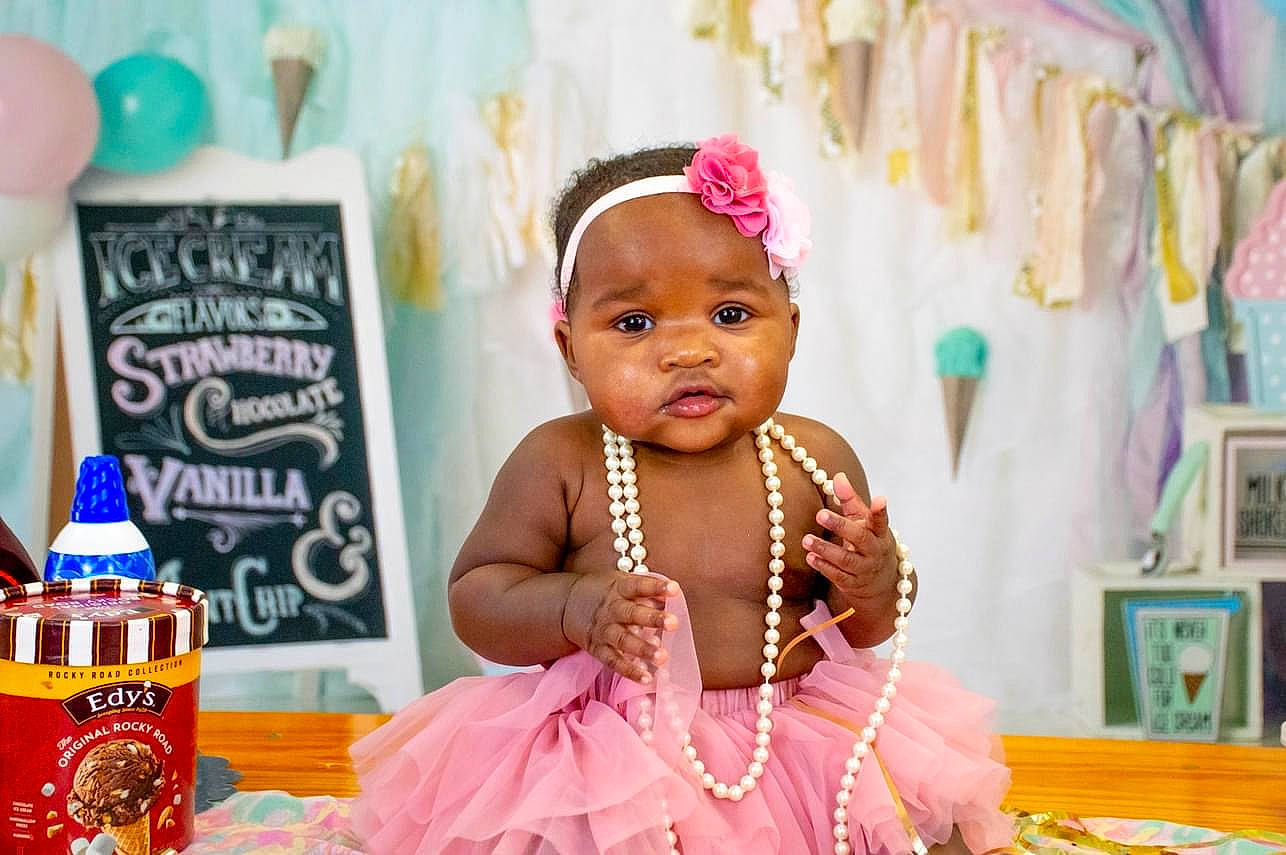 Alaya joined the competition — help win amazing prizes! baby, baby_toddler_clothing, balloon, birthday, child, dress, event, fashion_accessory, fun, happy, hat, jewellery, magenta, necklace, party_supply, person, pink, purple, room, toddler