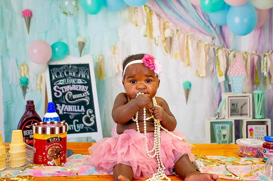 Alaya is registered to the contest to win money with this photo: balloon, birthday, birthday_party, cake_decorating_supply, child, decoration, dress, event, fun, happy, hat, leisure, party_supply, people, person, photograph, pink, summer, tableware, toddler