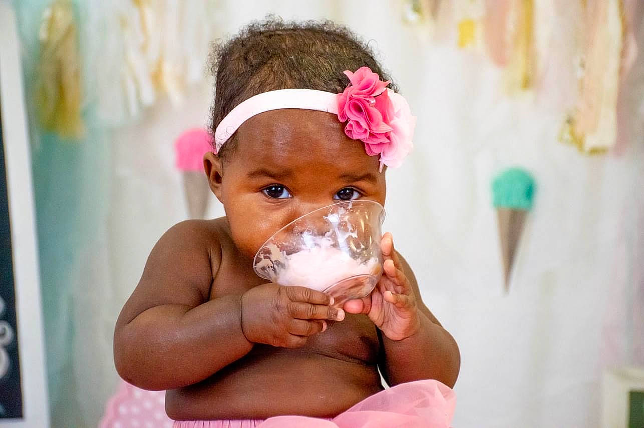 Alaya is registered to the contest to win money with this photo: baby, bathing, black_hair, cheek, child, chin, ear, eyebrow, eyelash, fashion_accessory, fun, hair_accessory, happy, headband, headgear, headpiece, nose, person, pink, skin