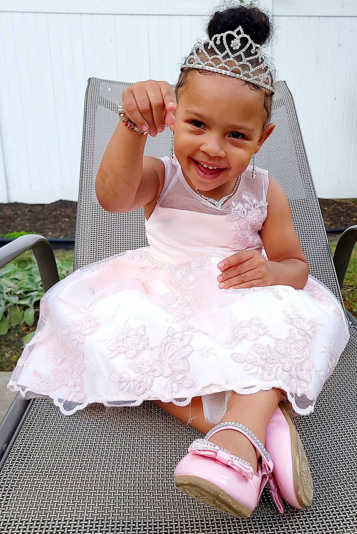 Alayah is registered to the contest to win money with this photo: baby, baby_toddler_clothing, bridal_accessory, child, embellishment, fashion_accessory, flash_photography, foot, happy, headband, headpiece, headwear, human_leg, jewellery, joy, pattern, person, pink, sitting, sleeve