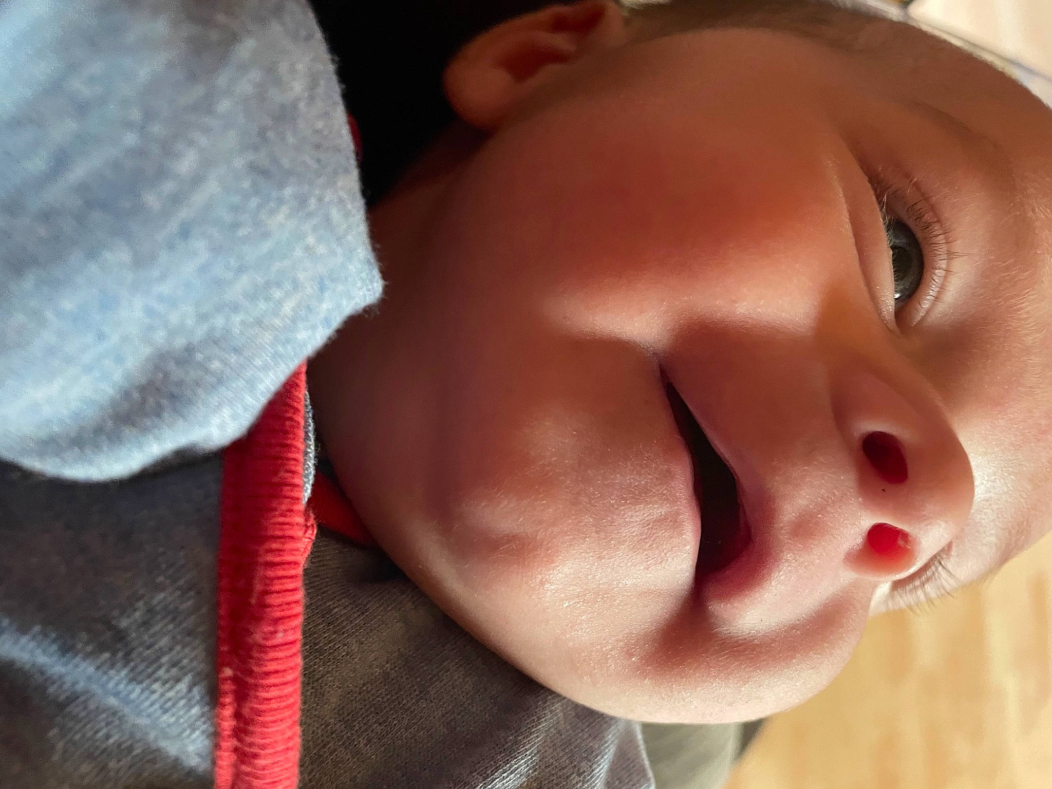 Hunter is registered to the contest to win money with this photo: baby, cheek, child, comfort, ear, eyelash, finger, gesture, happy, headgear, iris, jaw, lip, mouth, neck, nose, person, skin, smile, toddler