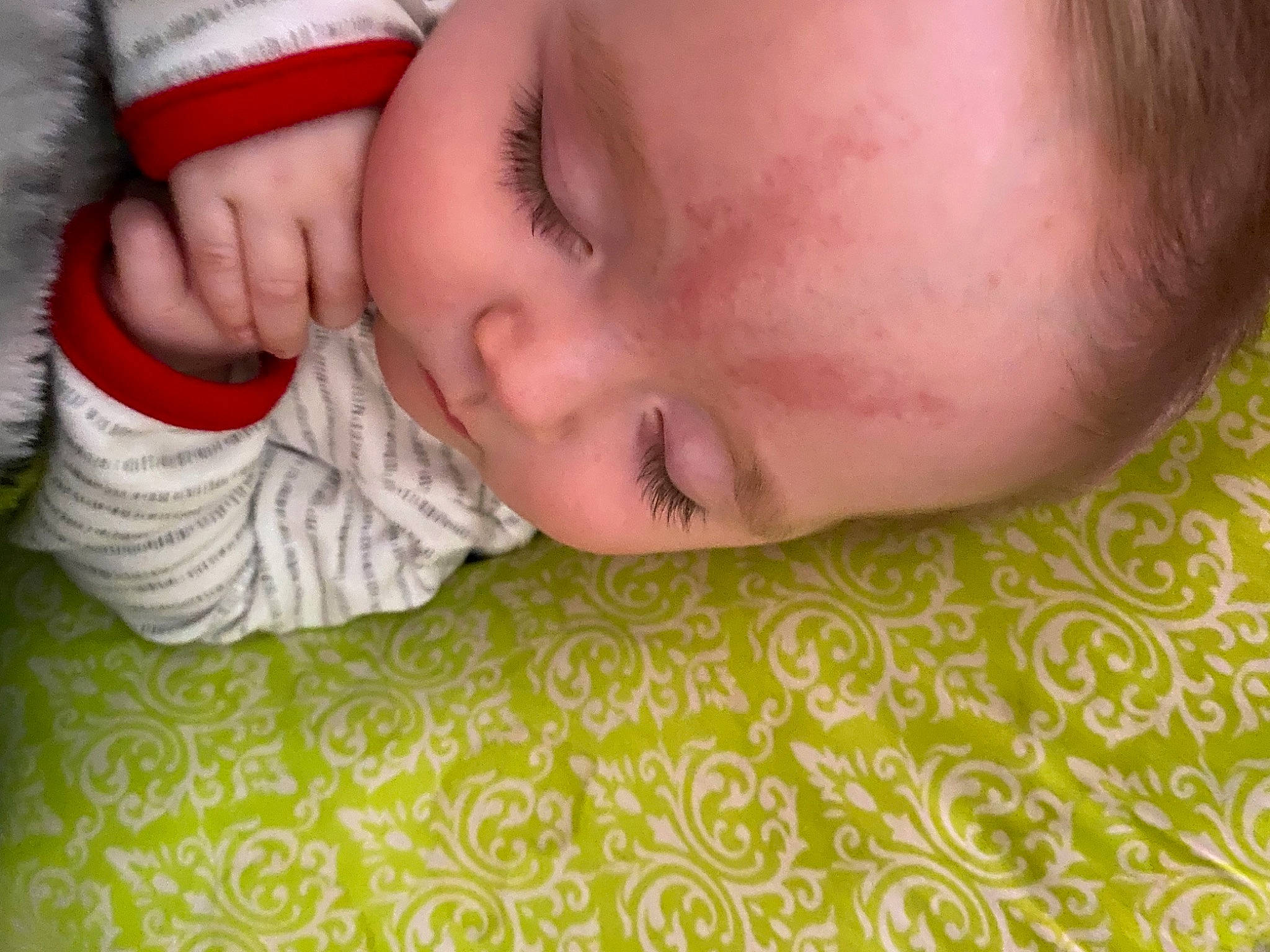 Cj is registered to the contest to win money with this photo: baby, baby_sleeping, baby_toddler_clothing, bedtime, cheek, child, comfort, eyelash, flooring, linens, lip, mammal, nap, nose, pattern, person, portrait_photography, skin, sleeve, toddler