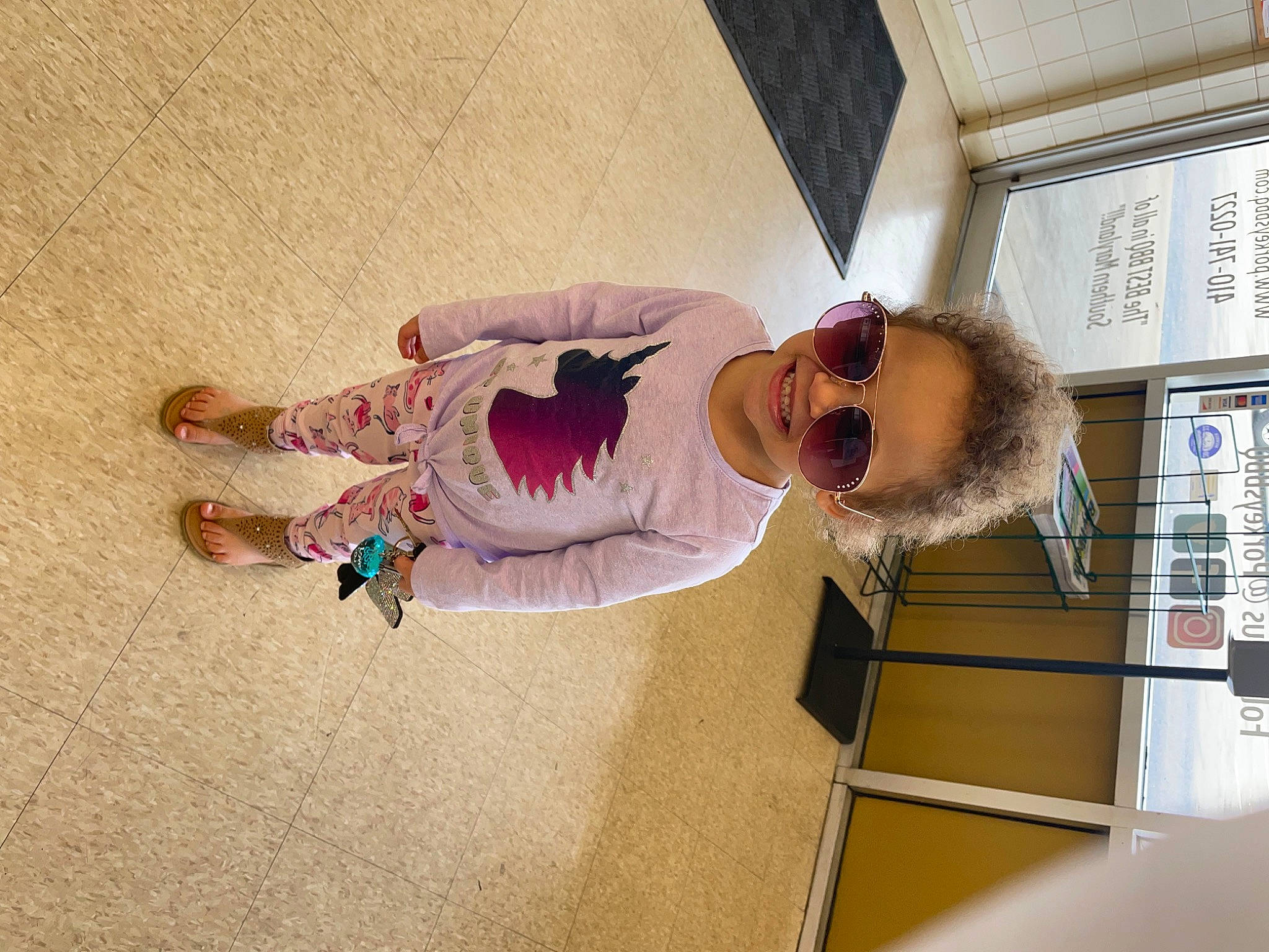 Stephanie joined the competition — help win amazing prizes! comfort, eyewear, floor, flooring, fun, happy, joy, knee, leisure, magenta, person, pink, room, smile, sunglasses, thigh, vacation, wood