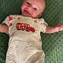 Grayson joined the competition — help win amazing prizes! baby, smiling, overalls, cartoon_car, green_blanket, cute, infant, clothing, happy, face, child, playful, texture, fabric, button, tongue_out, portrait, lying_down, casual, young