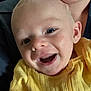 Grayson is registered to the contest to win money with this photo: baby, smiling, close_up, yellow_clothing, happy, infant, face, person, cute, child, portrait, skin, eyes, mouth, ear, joyful, expression, indoors, young, bright