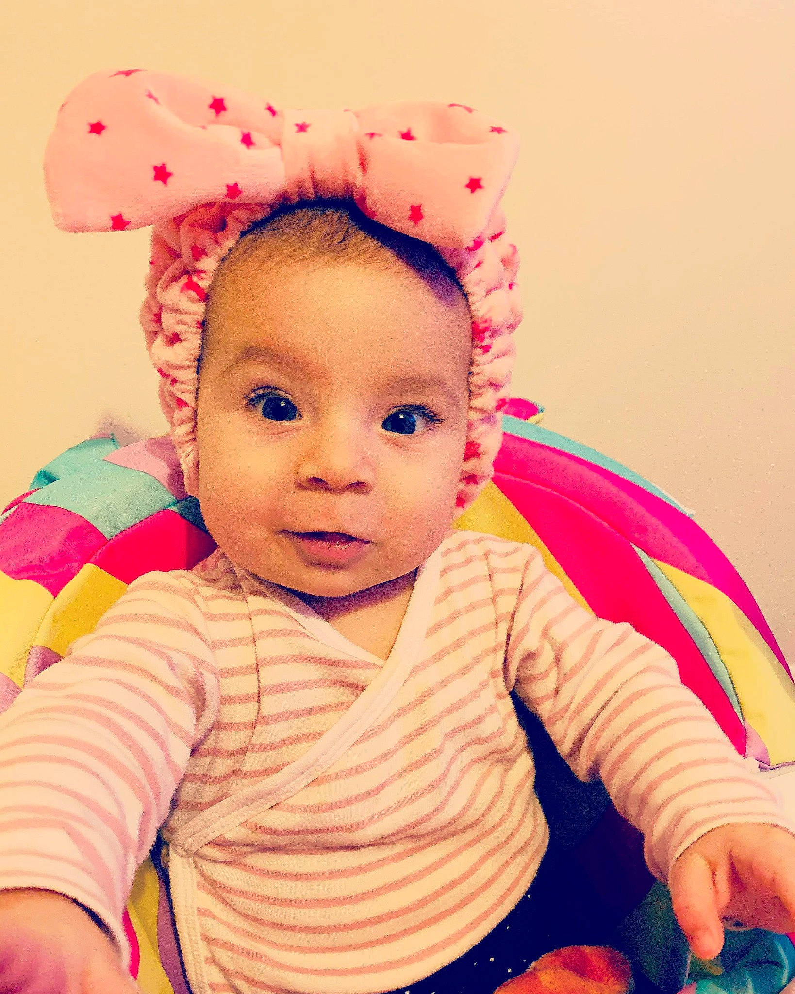 Sofia Save Miru is registered to the contest to win money with this photo: baby, baby_toddler_clothing, cap, cheek, chin, eye, face, facial_expression, happy, head, headgear, lip, nose, orange, person, pink, product, skin, sleeve, smile