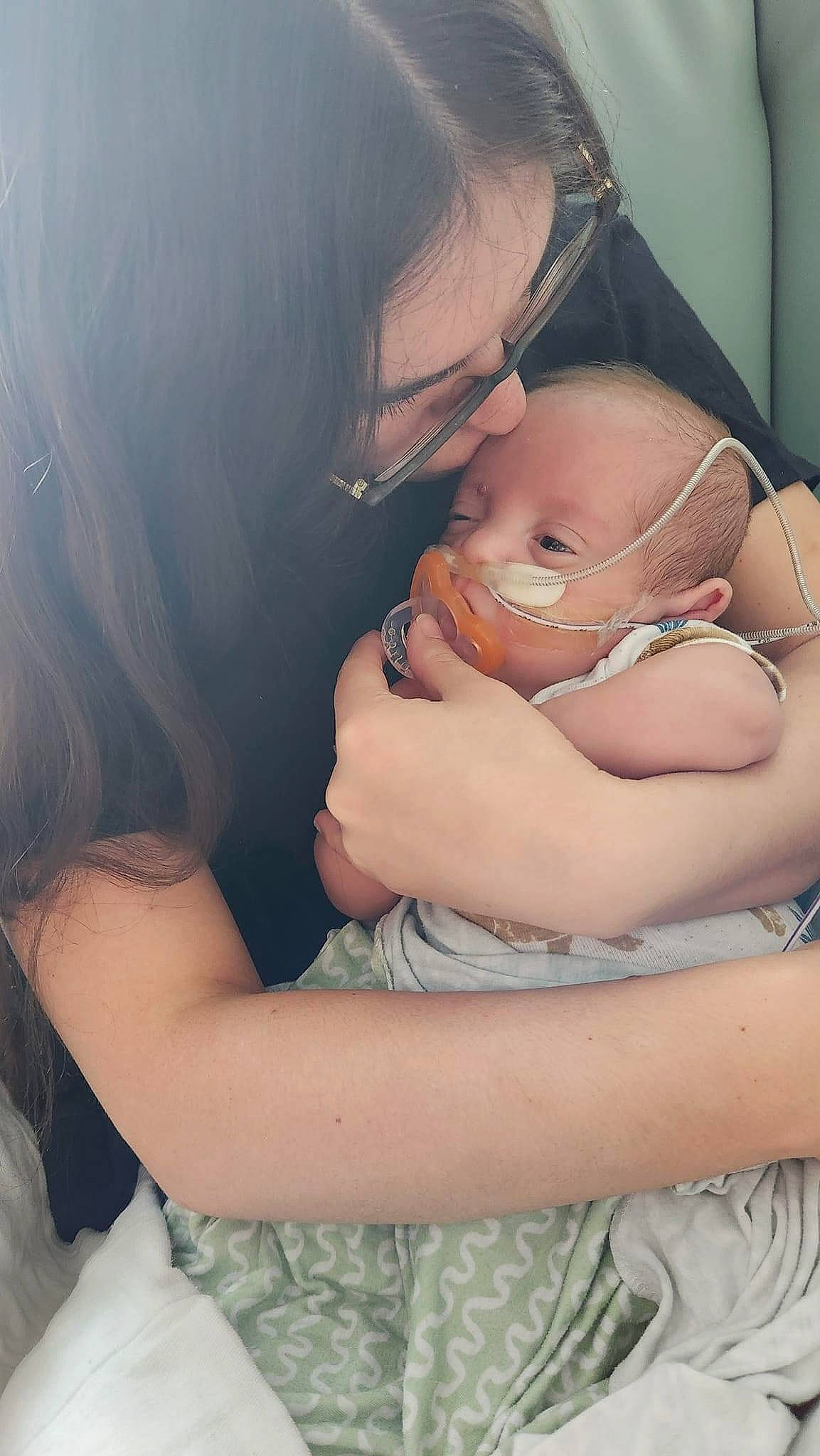 Desmond is registered to the contest to win money with this photo: abdomen, baby, baby_toddler_clothing, cheek, chest, child, comfort, elbow, fun, gesture, happy, love, nail, neck, person, shoulder, sitting, skin, sleep, sleeve