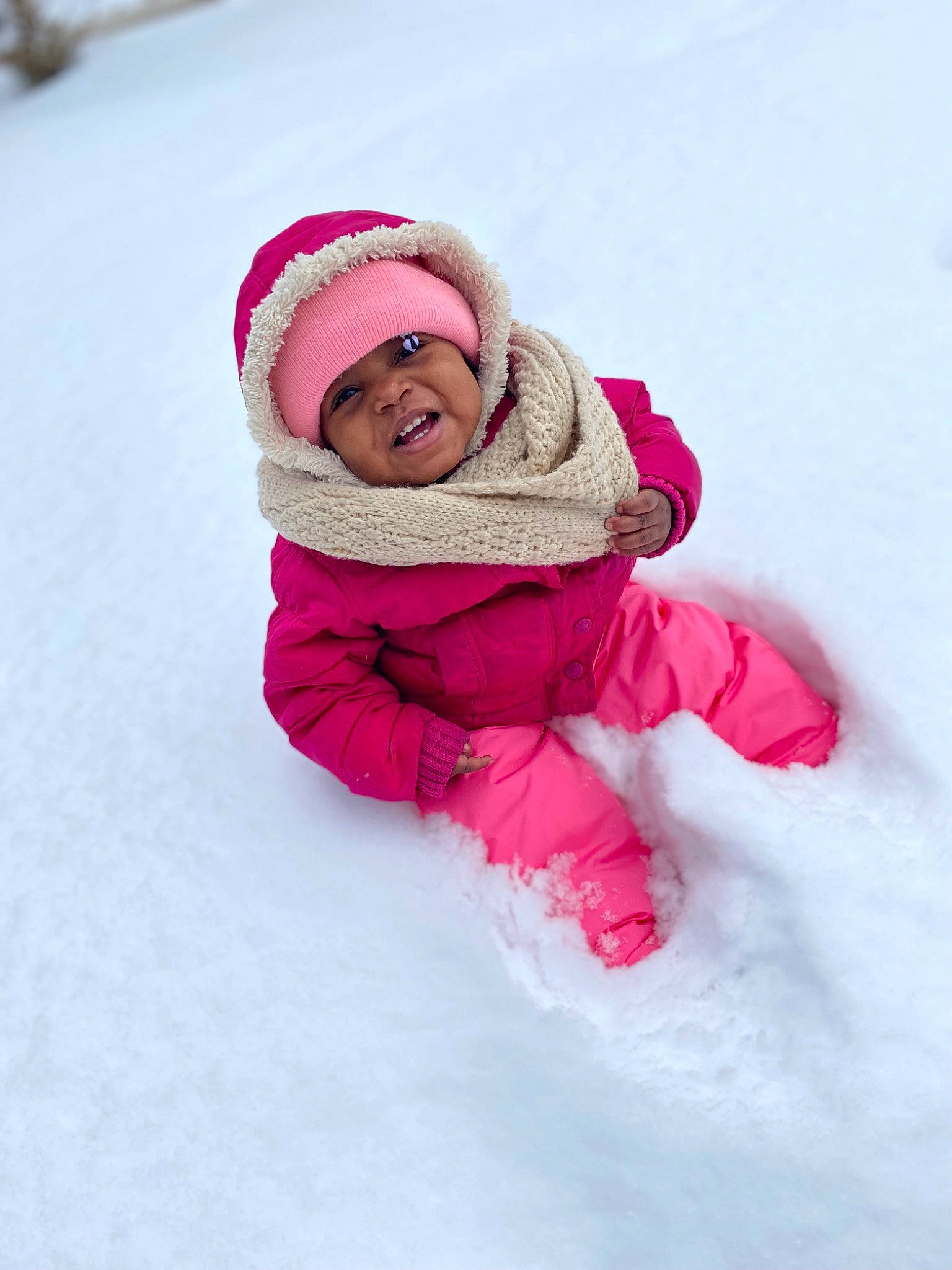 Tàchuana joined the competition — help win amazing prizes! baby, baby_toddler_clothing, cap, cheek, face, freezing, happy, headwear, hood, jacket, knit_cap, leisure, magenta, parka, person, pink, recreation, sleeve, smile, snow