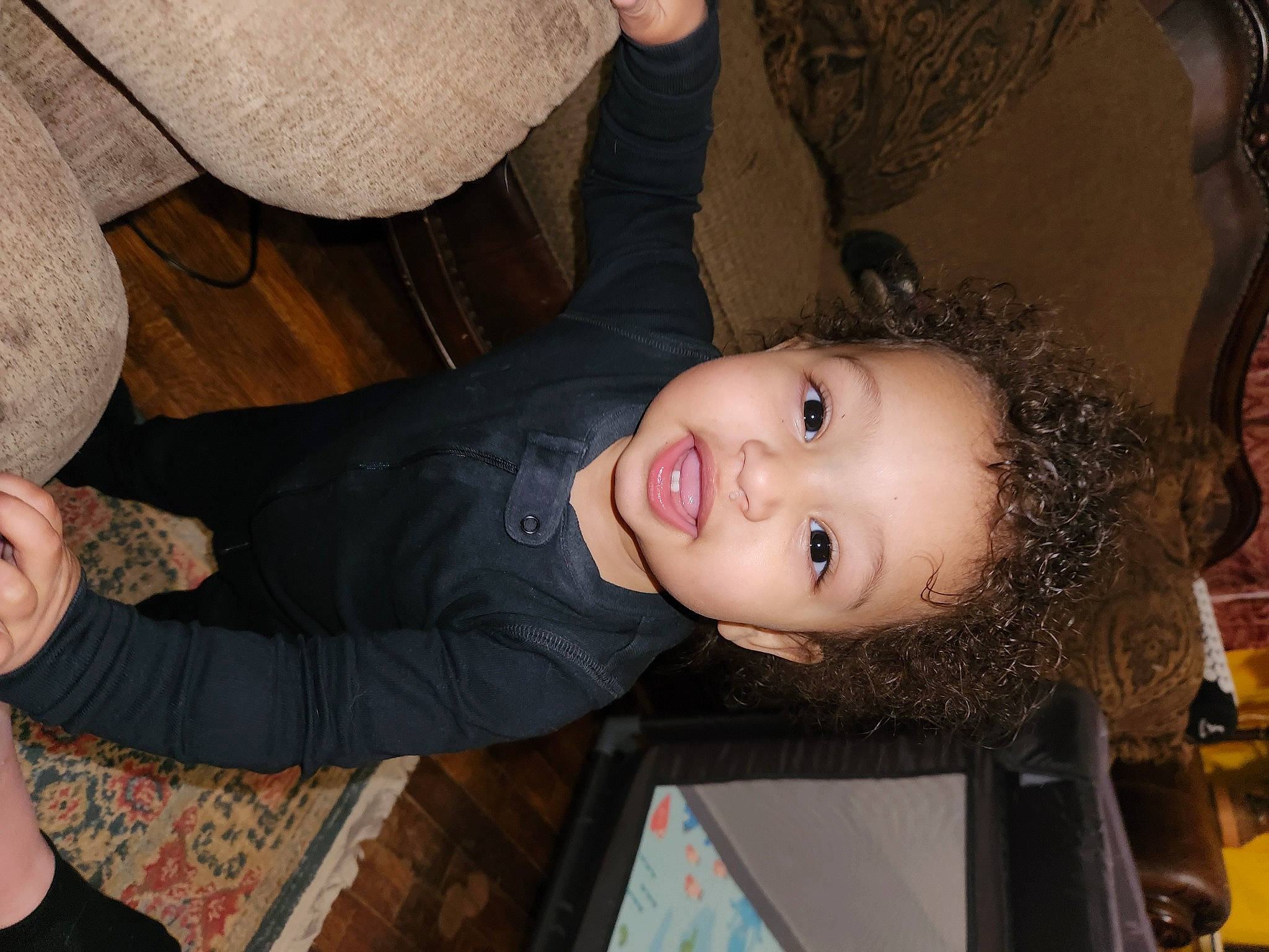 Warrick is registered to the contest to win money with this photo: cheek, child, ear, elbow, event, eyelash, facial_expression, flash_photography, fun, gesture, hairstyle, happy, iris, mouth, nose, person, sitting, skin, smile, toddler