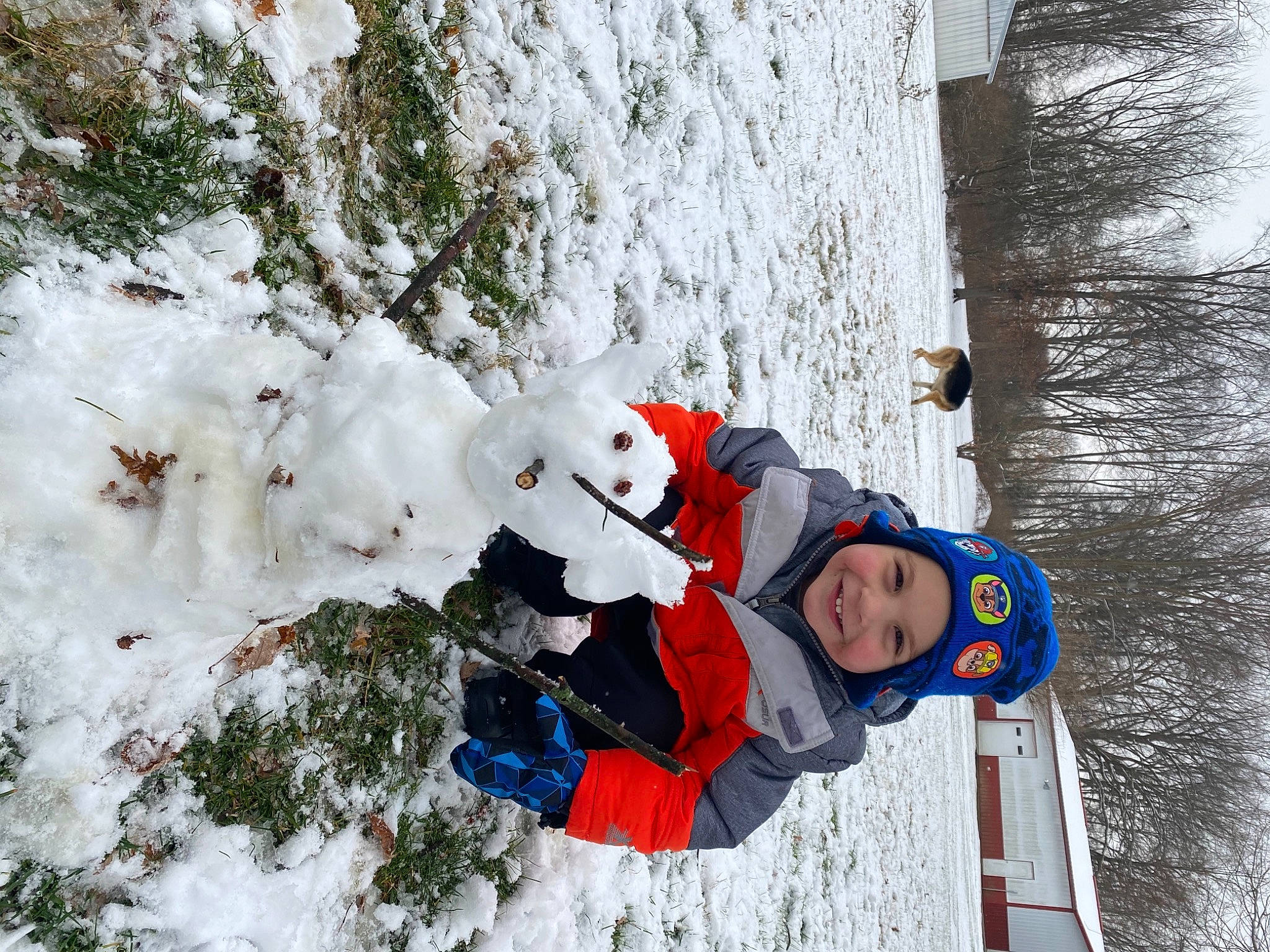 Aden is registered to the contest to win money with this photo: adventure, beanie, freezing, frost, geological_phenomenon, glove, headwear, holiday, ice, ice_cap, joy, knit_cap, person, playing_in_the_snow, precipitation, snow, winter