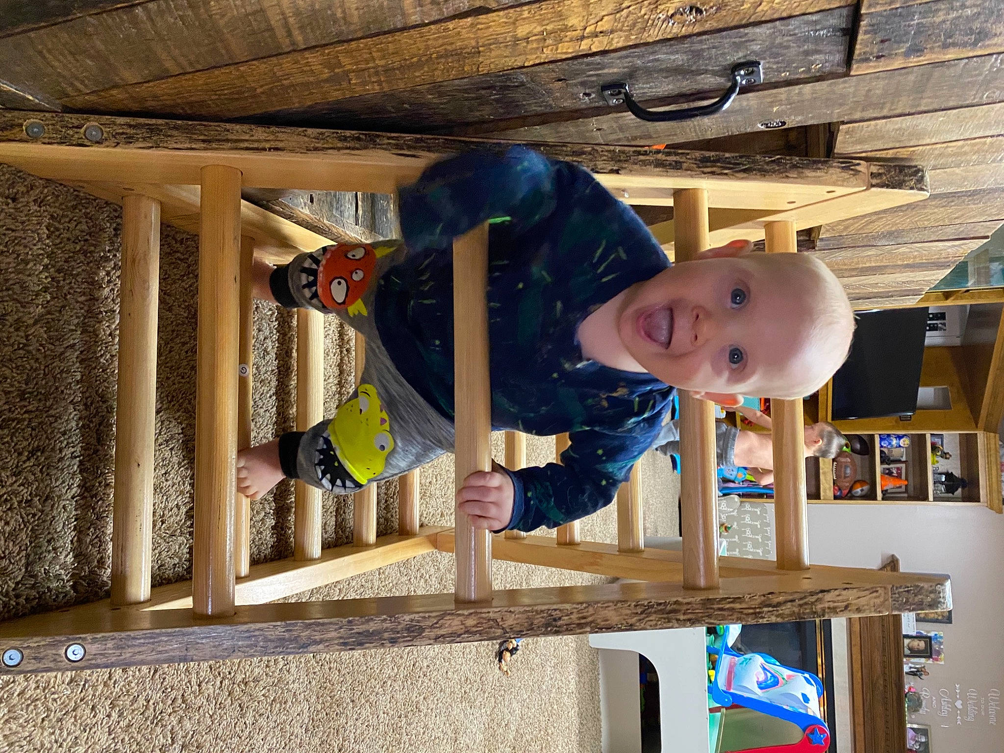Ellis joined the competition — help win amazing prizes! baby, baby_toddler_clothing, ceiling, child, fun, happy, hardwood, leisure, person, play, room, sleeve, smile, surprise, t_shirt, toddler, vacation, varnish, wood, wood_stain