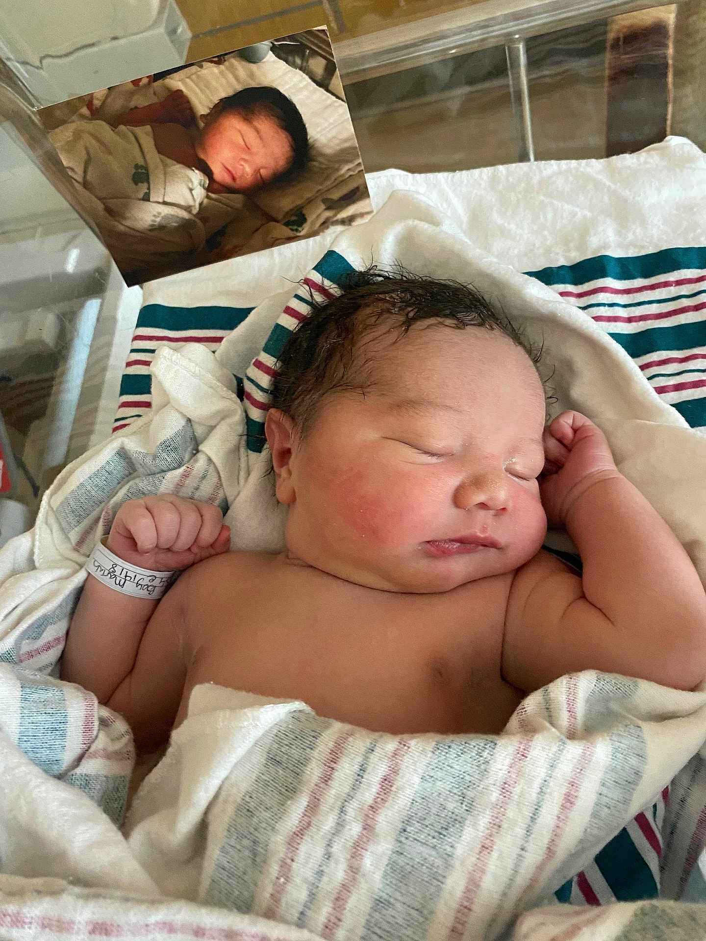 Legend is registered to the contest to win money with this photo: architecture, baby, bed, bedroom, blanket, building, clothing, cushion, face, furniture, glove, head, homedecor, hospital, newborn, person, photography, portrait, quilt, sleeping