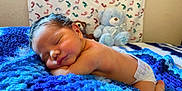 Legend joined the competition — help win amazing prizes! baby, bed, bedroom, blanket, cushion, face, furniture, head, homedecor, indoors, newborn, person, photography, portrait, quilt, room, sleeping, spa, teddybear, toy