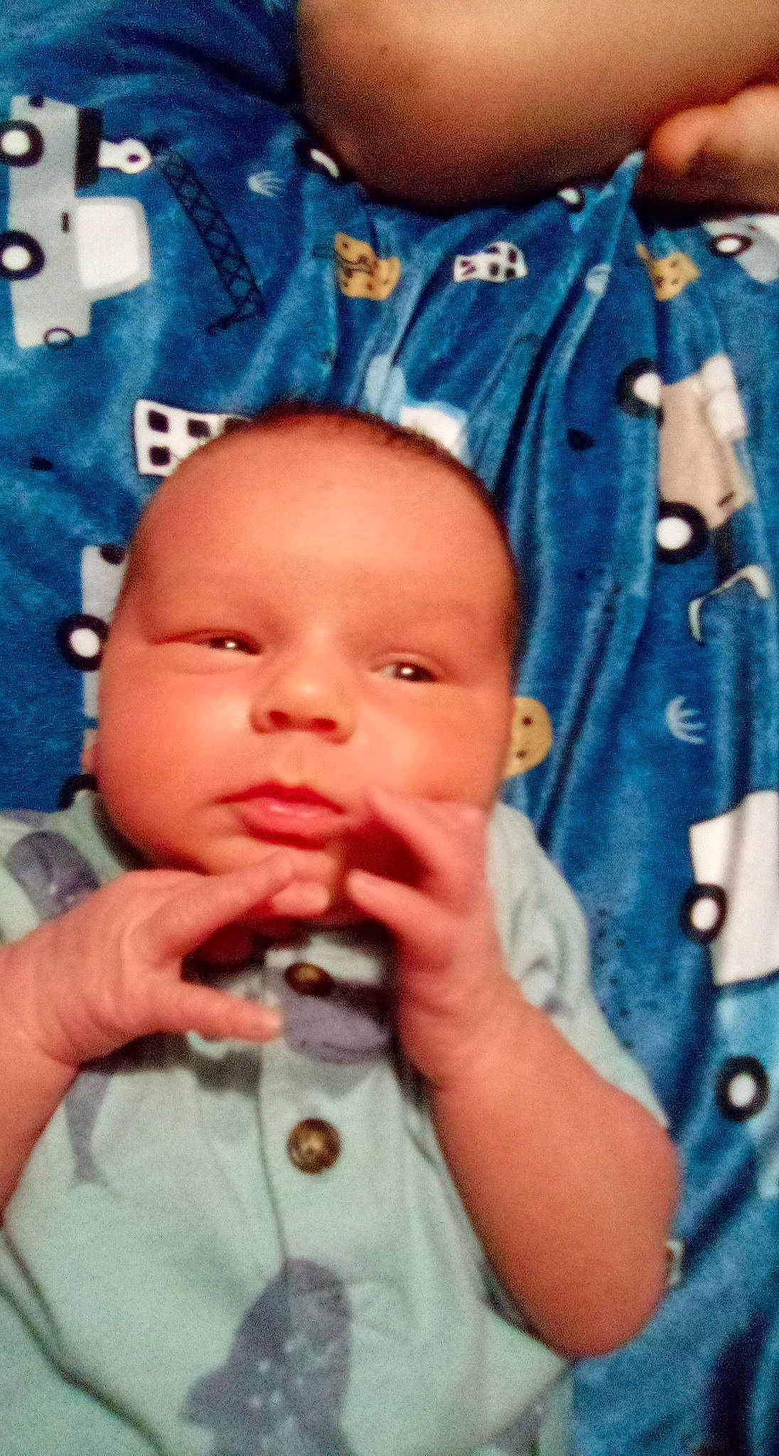 Noah is registered to the contest to win money with this photo: baby, baby_toddler_clothing, blue, cheek, chin, cool, ear, eye, eyebrow, gesture, happy, head, iris, lip, mouth, nose, person, skin, sleeve, toddler