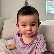 Alexus joined the competition — help win amazing prizes! baby, blanket, child, clothing, couch, cute, eyebrows, eyes, face, hair, hand, indoors, person, sitting, skin, smile, soft_lighting, striped_shirt, toddler, window