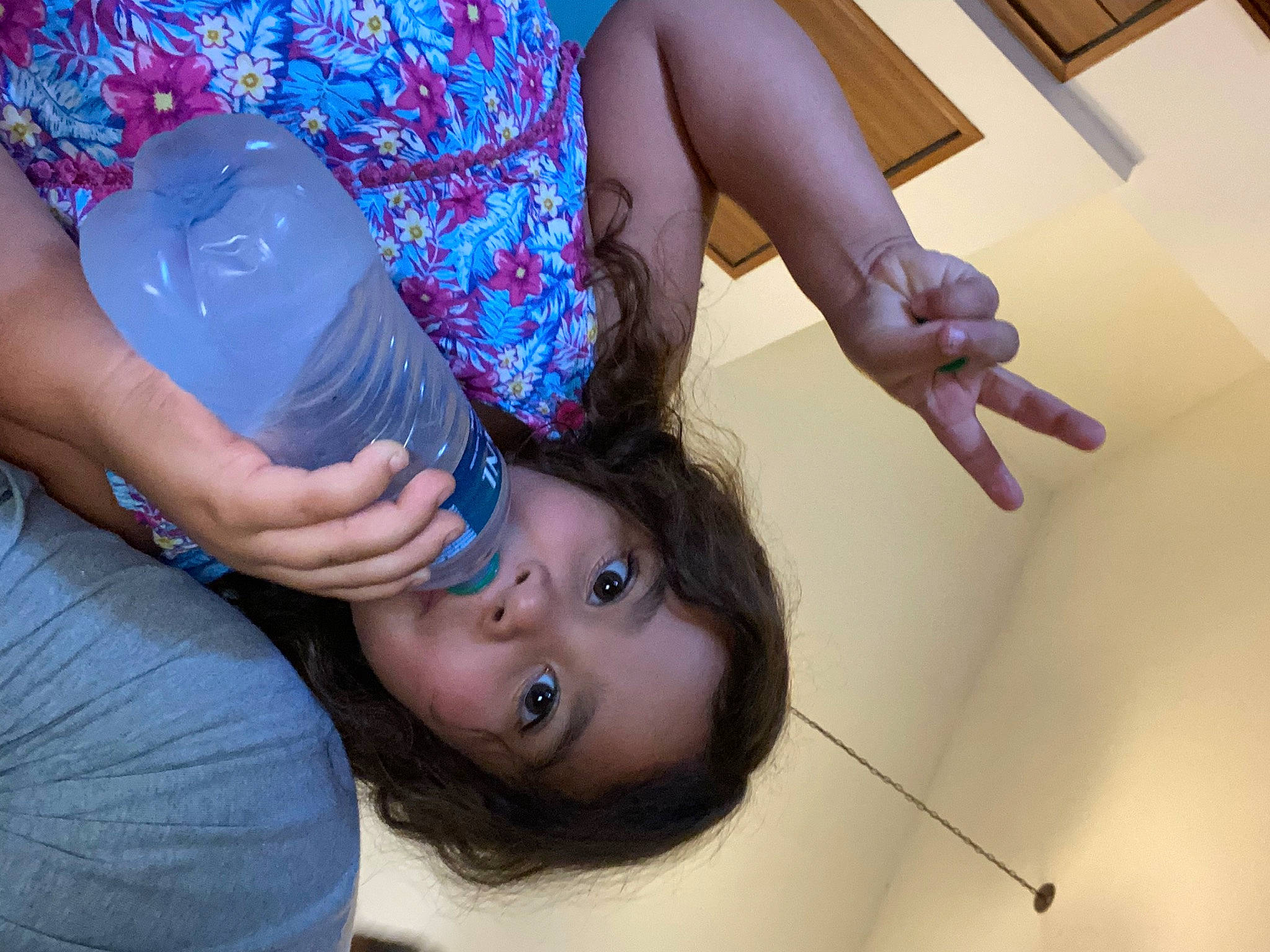 Olive is registered to the contest to win money with this photo: abdomen, chest, elbow, eyelash, finger, fun, gesture, hand, happy, joint, leg, muscle, nail, person, purple, thigh, thumb, toddler, tree, trunk