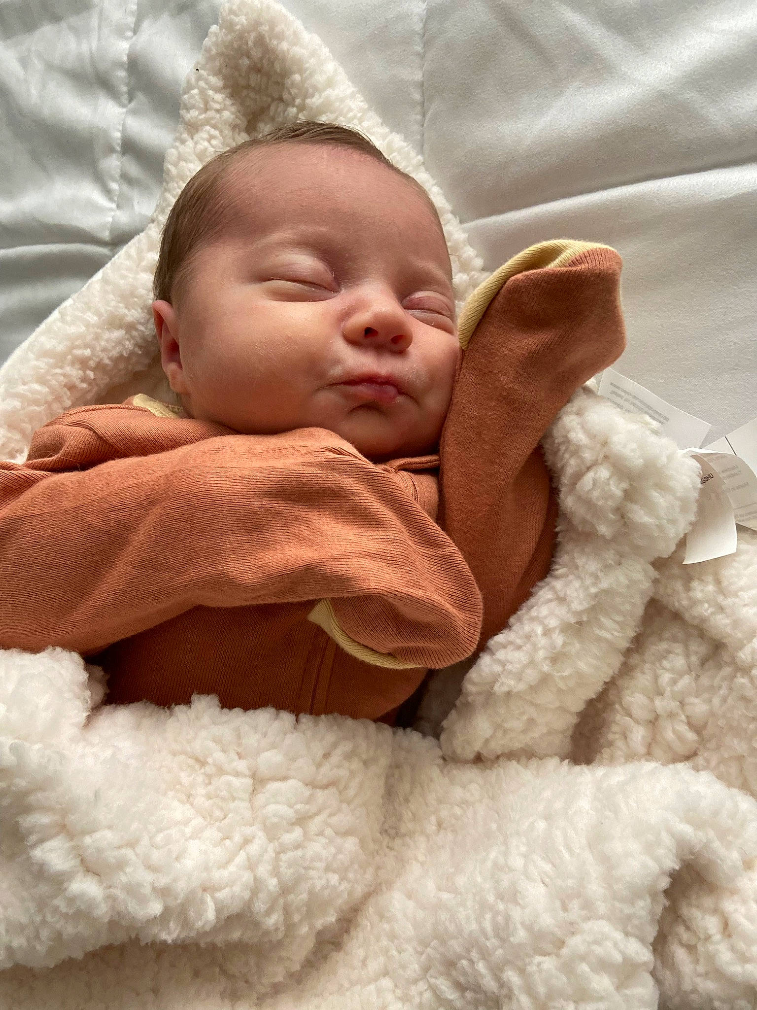 Charlie is registered to the contest to win money with this photo: baby, baby_sleeping, baby_toddler_clothing, bedtime, cheek, child, comfort, eye, face, fur, gesture, happy, head, linens, nose, person, skin, textile, toddler, white