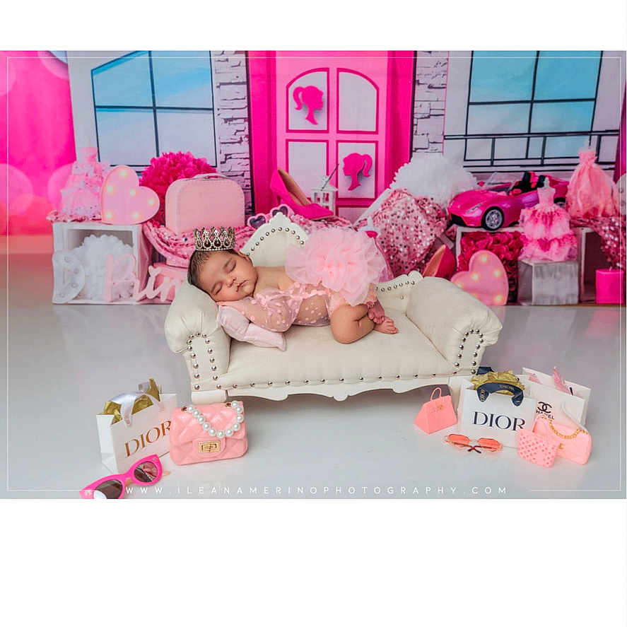 Vihana is registered to the contest to win money with this photo: baby, background, child, crown, cute, decor, designer_bags, fashion, indoor, miniature, photography, pink, playful, portrait, props, resting, sleeping, sofa, soft_lighting, toy