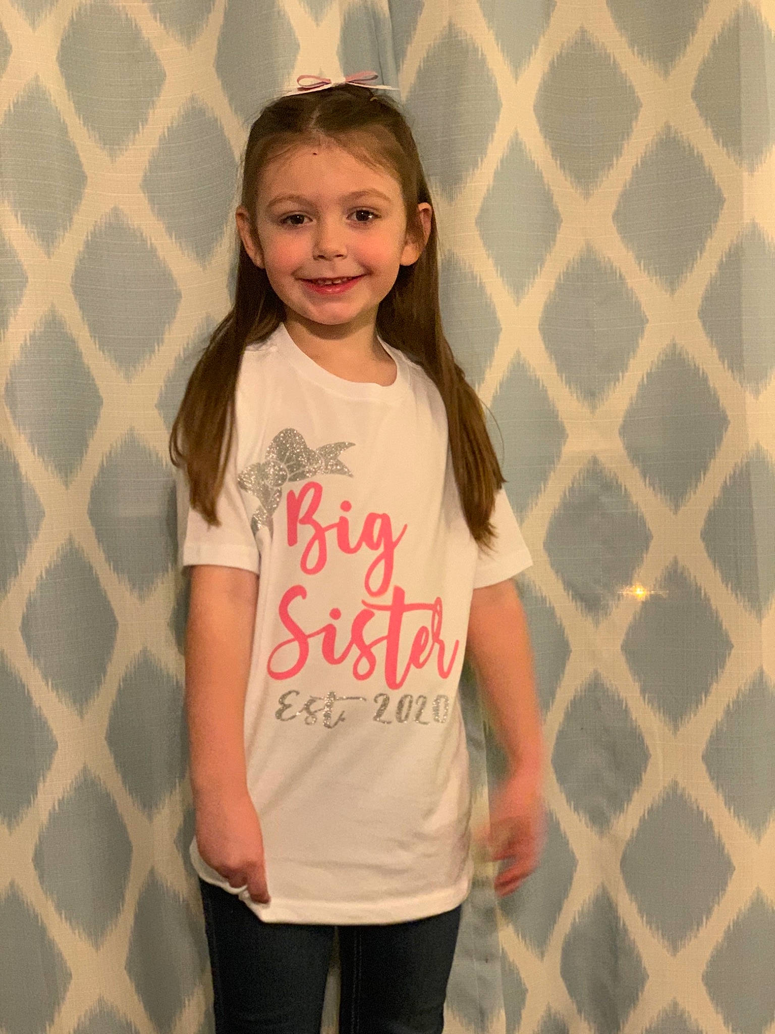 Kinsleigh joined the competition — help win amazing prizes! child, child_model, clothing, cool, happy, head, joy, neck, outerwear, person, shoulder, sleeve, smile, standing, t_shirt, toddler, top