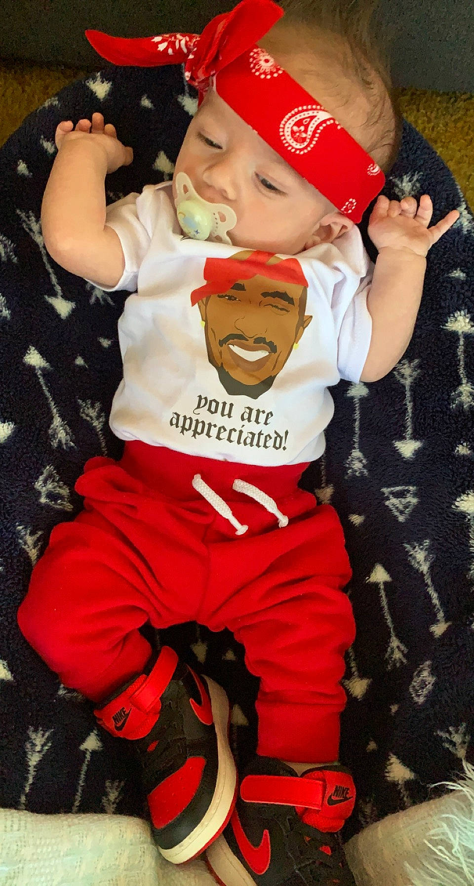 Paxton is registered to the contest to win money with this photo: baby, baby_toddler_clothing, baseball_cap, cap, child, costume_hat, event, fictional_character, gesture, glove, happy, hat, headwear, muscle, person, personal_protective_equipment, sleeve, smile, sports_uniform, sportswear