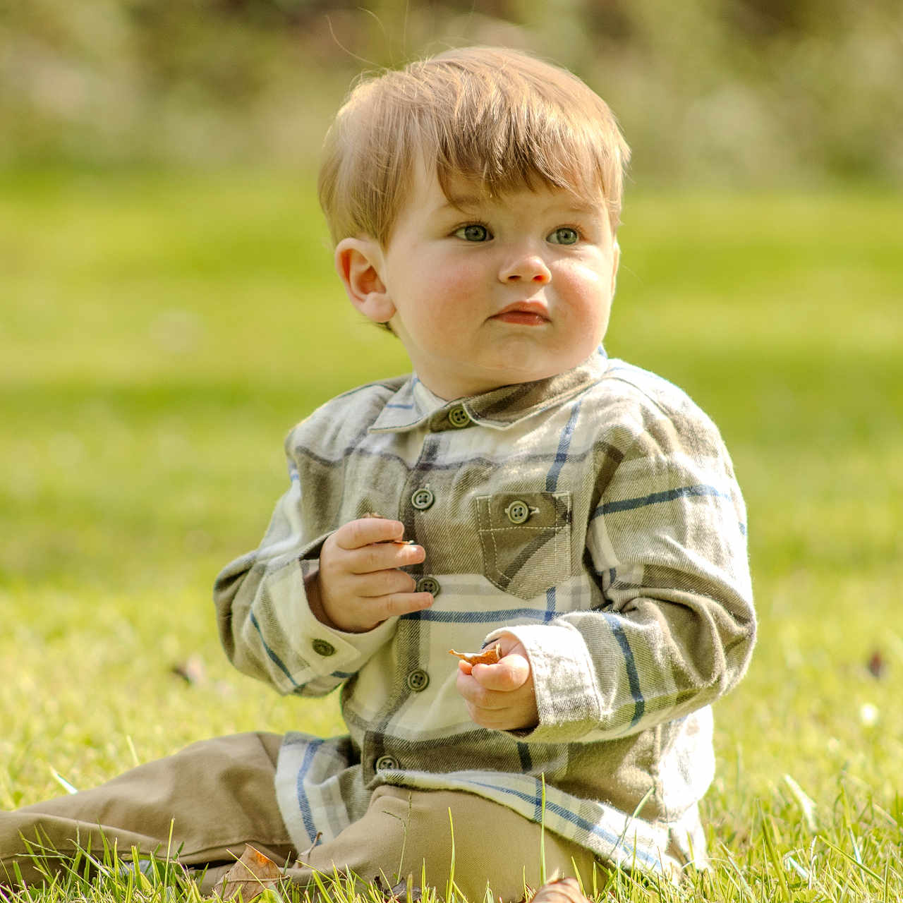 Levi joined the competition — help win amazing prizes! bodypart, boy, child, clothing, face, finger, grass, hand, head, knitwear, lawn, longsleeve, male, pants, person, photography, plant, portrait, sitting, sleeve