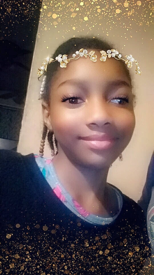 Zaria is registered to the contest to win money with this photo: beauty, black_hair, cheek, eyebrow, eyelash, face, fashion_accessory, forehead, hair, hair_accessory, hairstyle, head, headgear, headpiece, jewellery, joy, lip, nose, person, photography