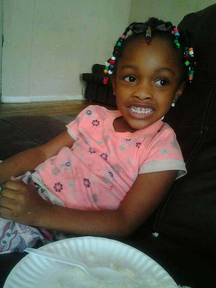 Lailah joined the competition — help win amazing prizes! baby, black_hair, cheek, child, cornrows, daughter, face, forehead, fun, hair, hair_accessory, hairstyle, head, joy, lip, nose, person, pink, sitting, skin